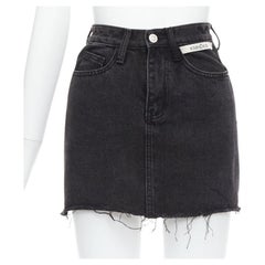 KIMHEKIM My Uniform black washed denim white logo tag frayed skirt S