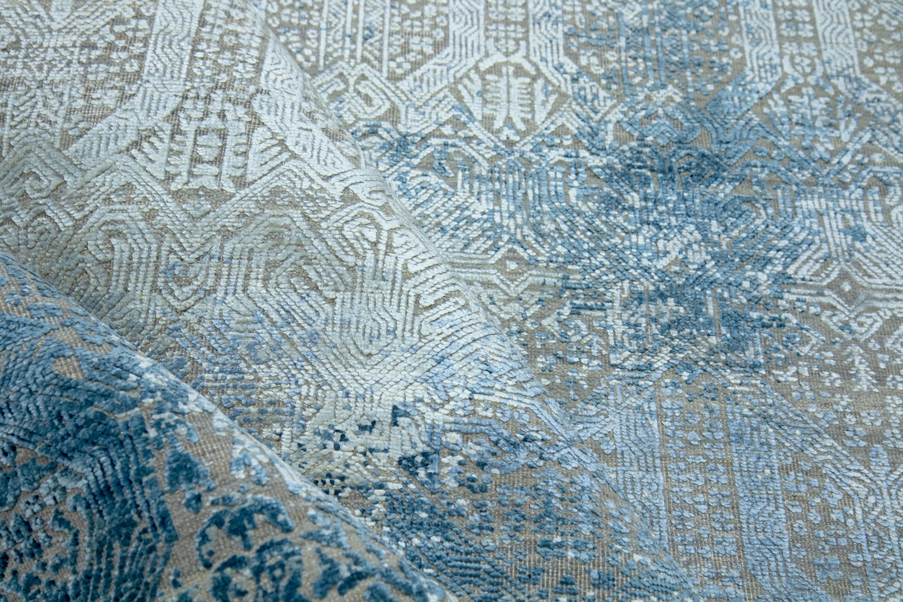 Kimia grey blue
Rug from Allegory collection of edition Bougainville
Persian hand knotted
Wool, pure silk
Size: 300 x 400cm.

ALLEGORY
Our collection, Allegory, is a tribute to the persian culture and their secular art form used in the creation of