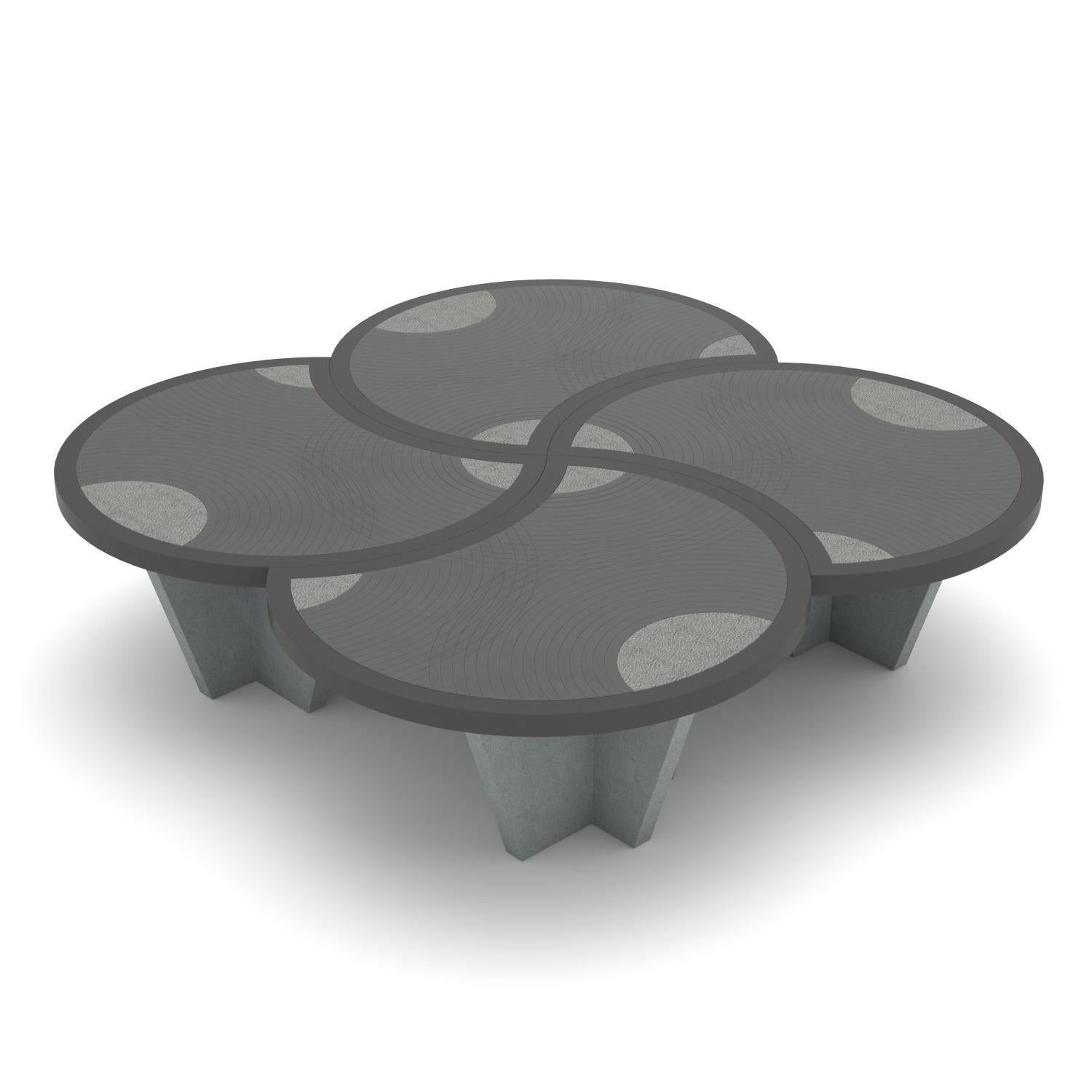 A design coffee table in pietra serena with water-jet decoration, Kimono can be used individually or combined in compositions of several pieces. Indeed, the union of four components allows you to appreciate the complete design, an interpretation of