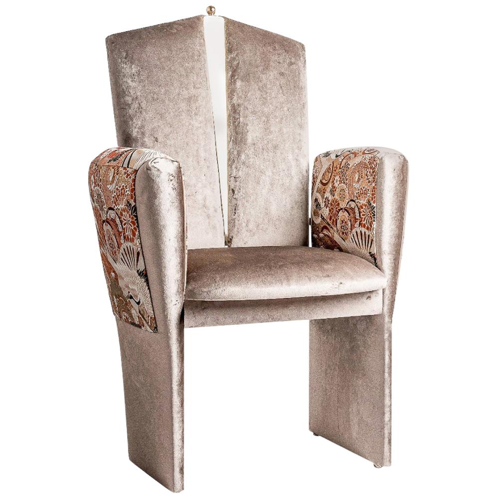 For 20 years, we have been committed to offering you unique collections in terms of design and quality.

The Kimono fauteuil; made of solid birch wood, upholstered with an elegant velvet; with its original vintage Japanese obi sleeves, made of