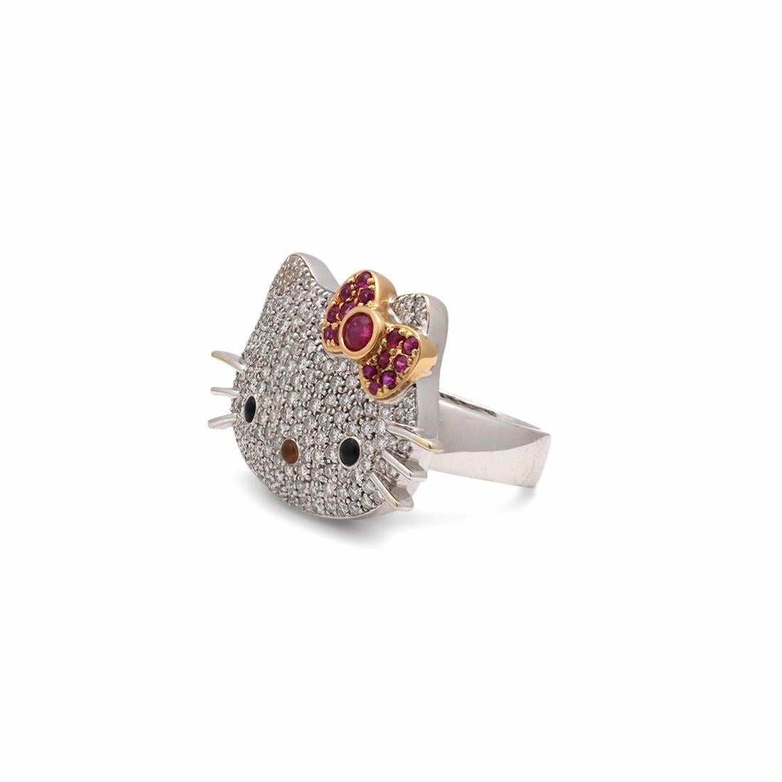 Sanrio's whimsical Hello Kitty character reimagined by Kimora Lee Simmons as ring crafted in 18 karat White gold. The ring is set with approx. 1.20 carats of round brilliant cut diamonds (F-G color, VS clarity). Hello Kitty's signature bow is set