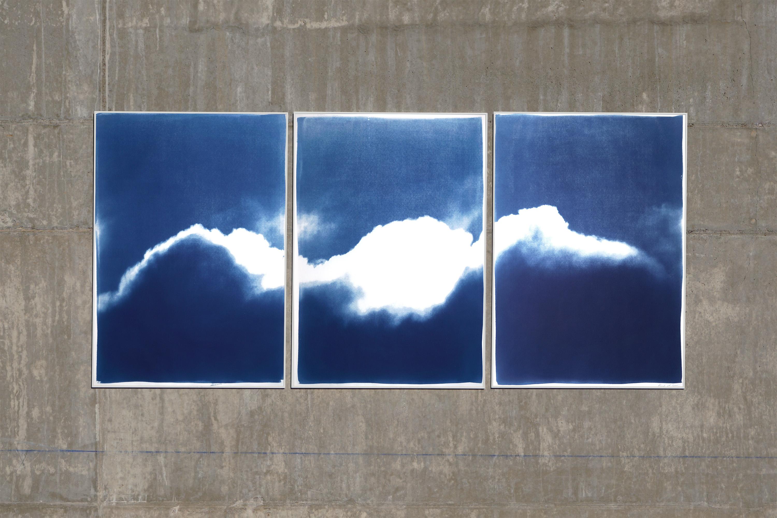 This is an exclusive handprinted limited edition cyanotype.

This beautiful triptych displays a serene cloud smoothly traveling after a storm. 
 
Details:
+ Title: Waves of Clouds
+ Year: 2021
+ Edition Size: 100
+ Stamped and Certificate of