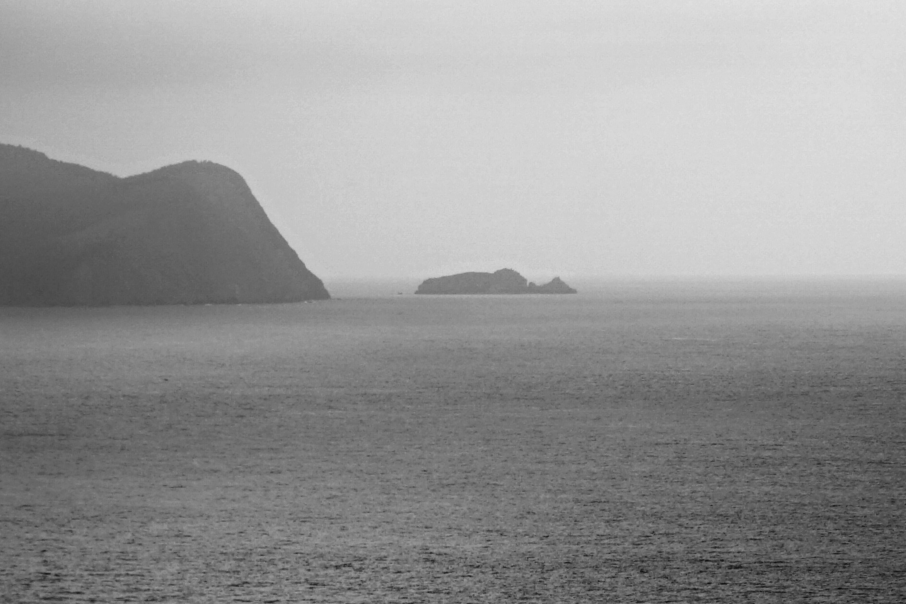  Black and White Misty Sailboat Journey, Regatta Seascape, Mediterranean Coast - Realist Photograph by Kind of Cyan