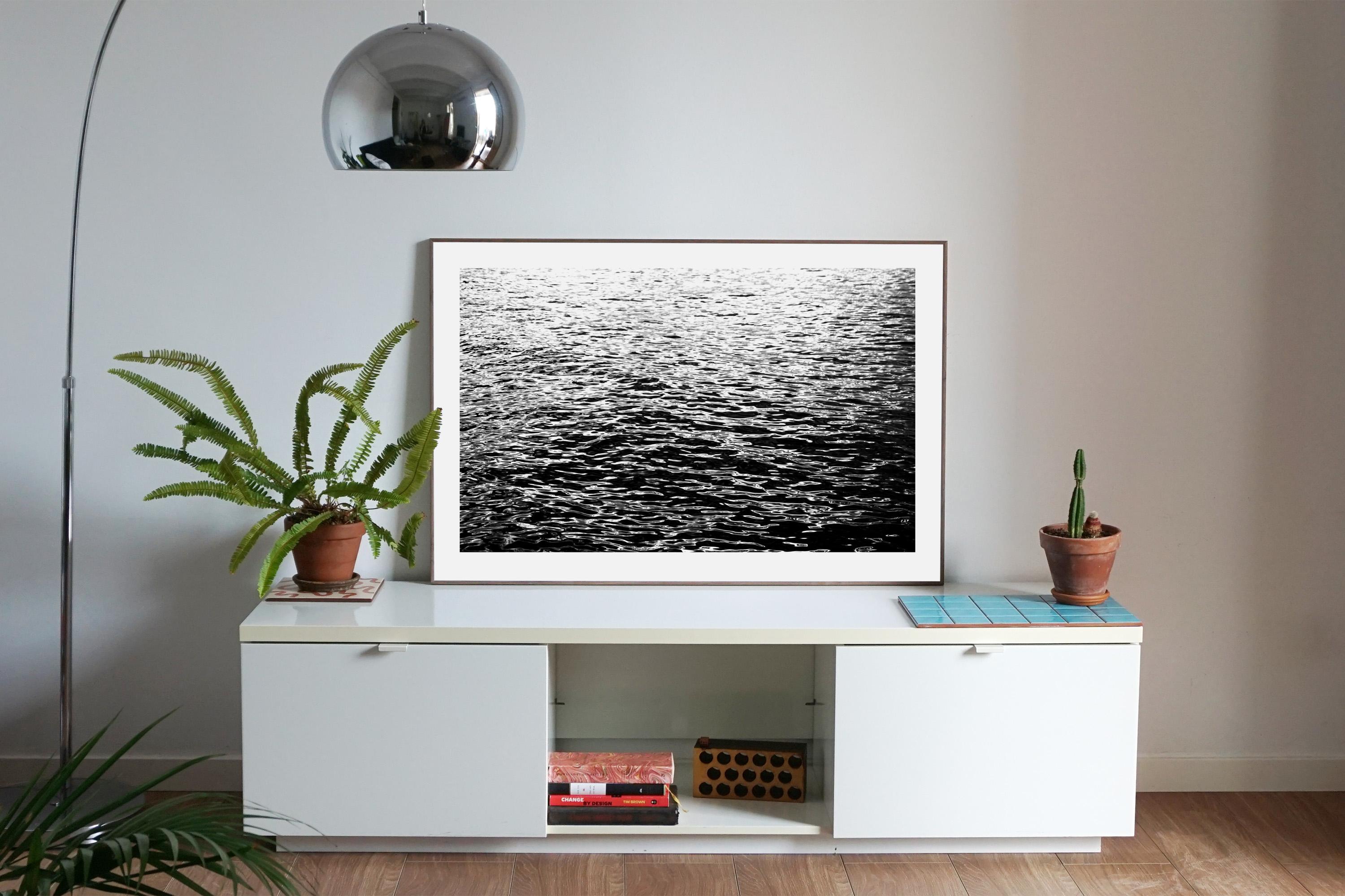 Large Black and White Seascape of Calming Sea Ripples, Abstract Water Reflection - Minimalist Photograph by Kind of Cyan