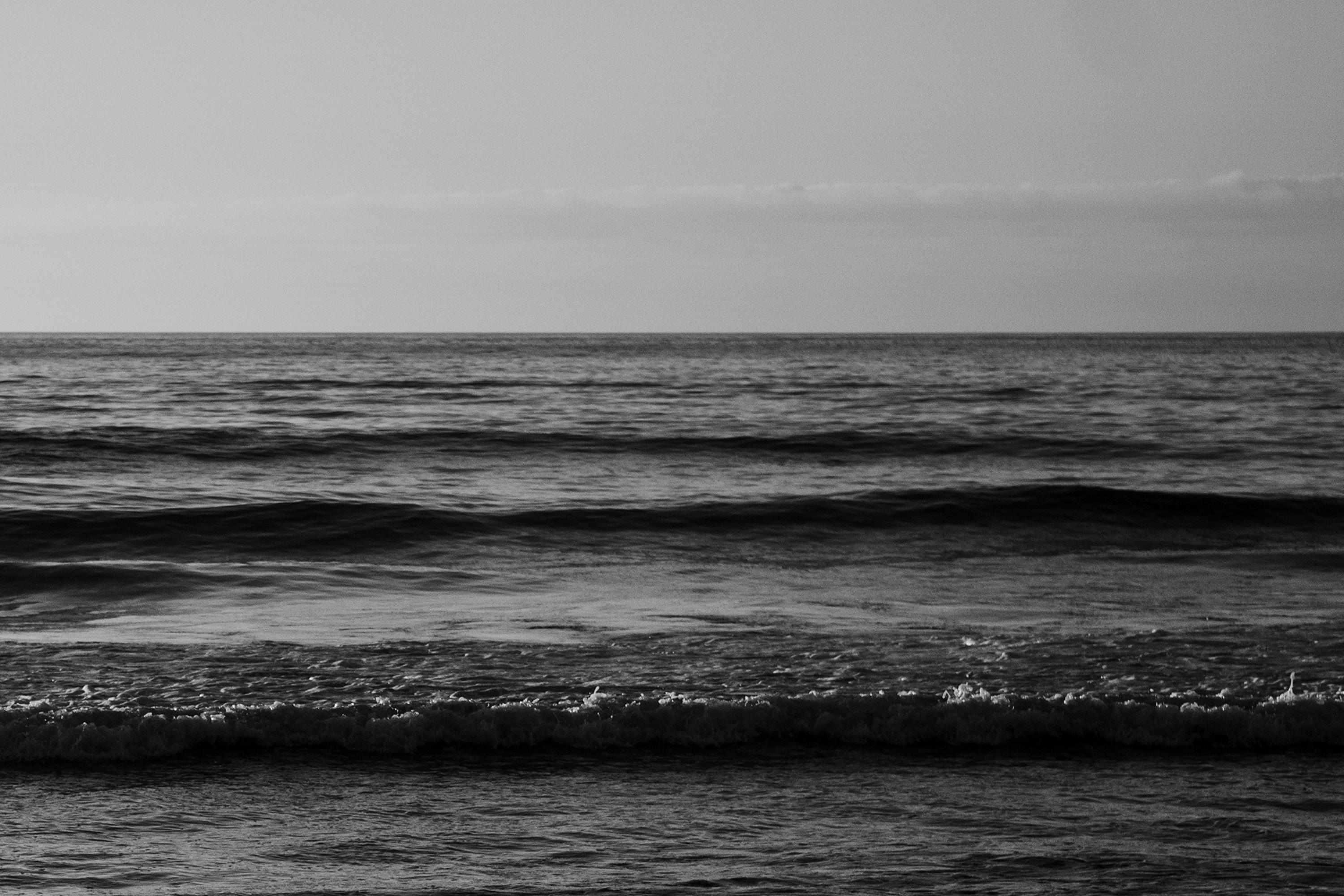 Pacific Beach Horizon, Colossal Seascape in Black and White, Navy Sunset, Classy - Photorealist Photograph by Kind of Cyan