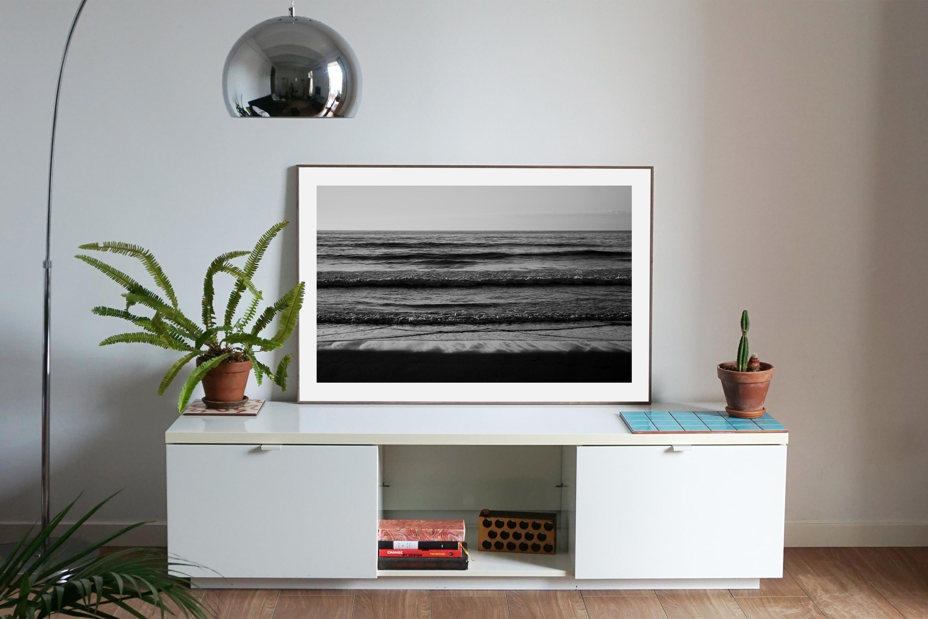 This is an exclusive limited edition black and white Giclée print, on 100% cotton Hahnemühle Photo Rag Fine Art matte paper.

This gorgeous black and white high contrast photograph shows a stunning sunset seascape beach horizon in a Pacific