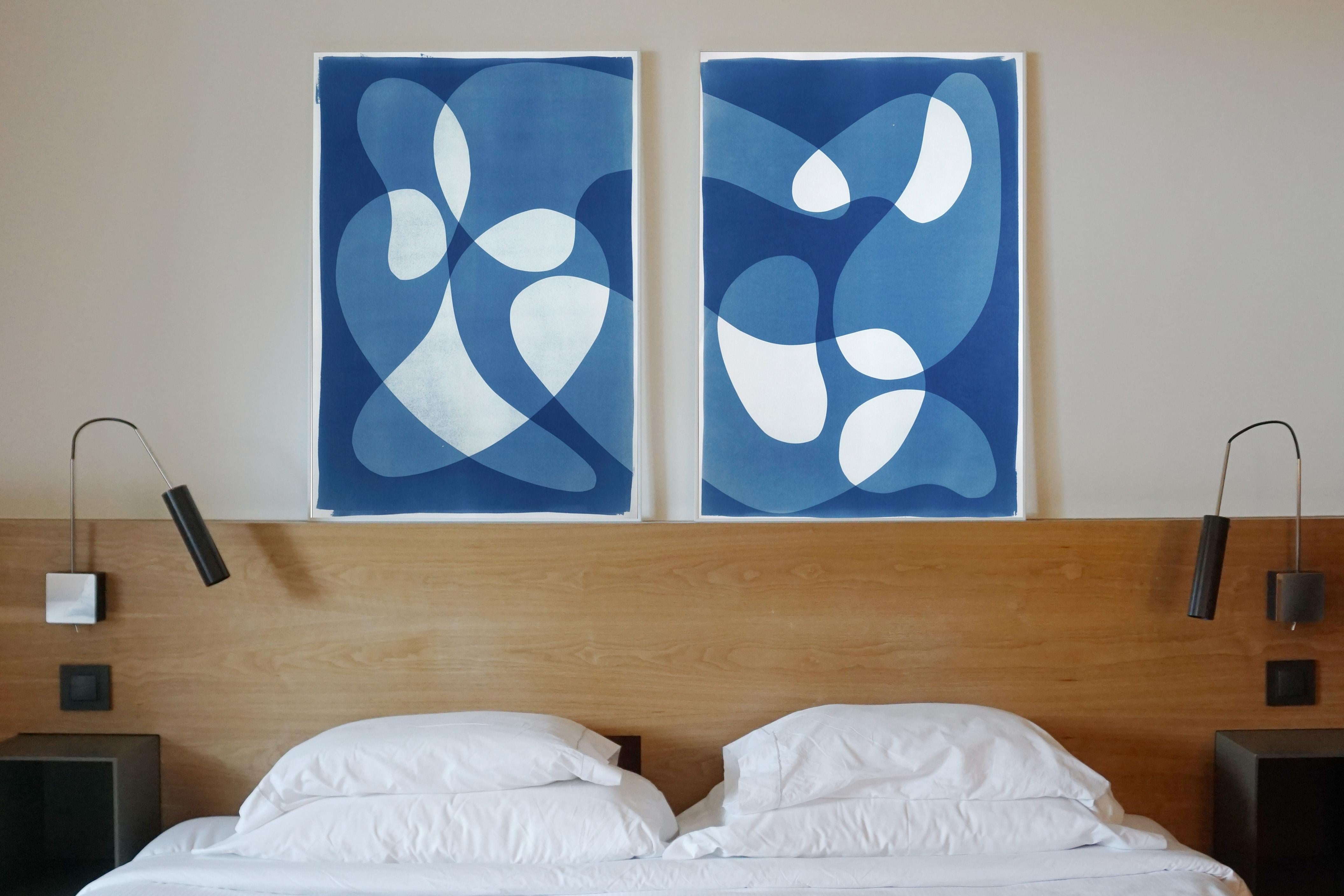 This is an exclusive handprinted unique cyanotype on watercolor paper.
This diptych gets its inspiration from mid-century modern shapes and compositions. It's made by layering paper cutouts and different exposures using uv-light.

Details:
+ Title: