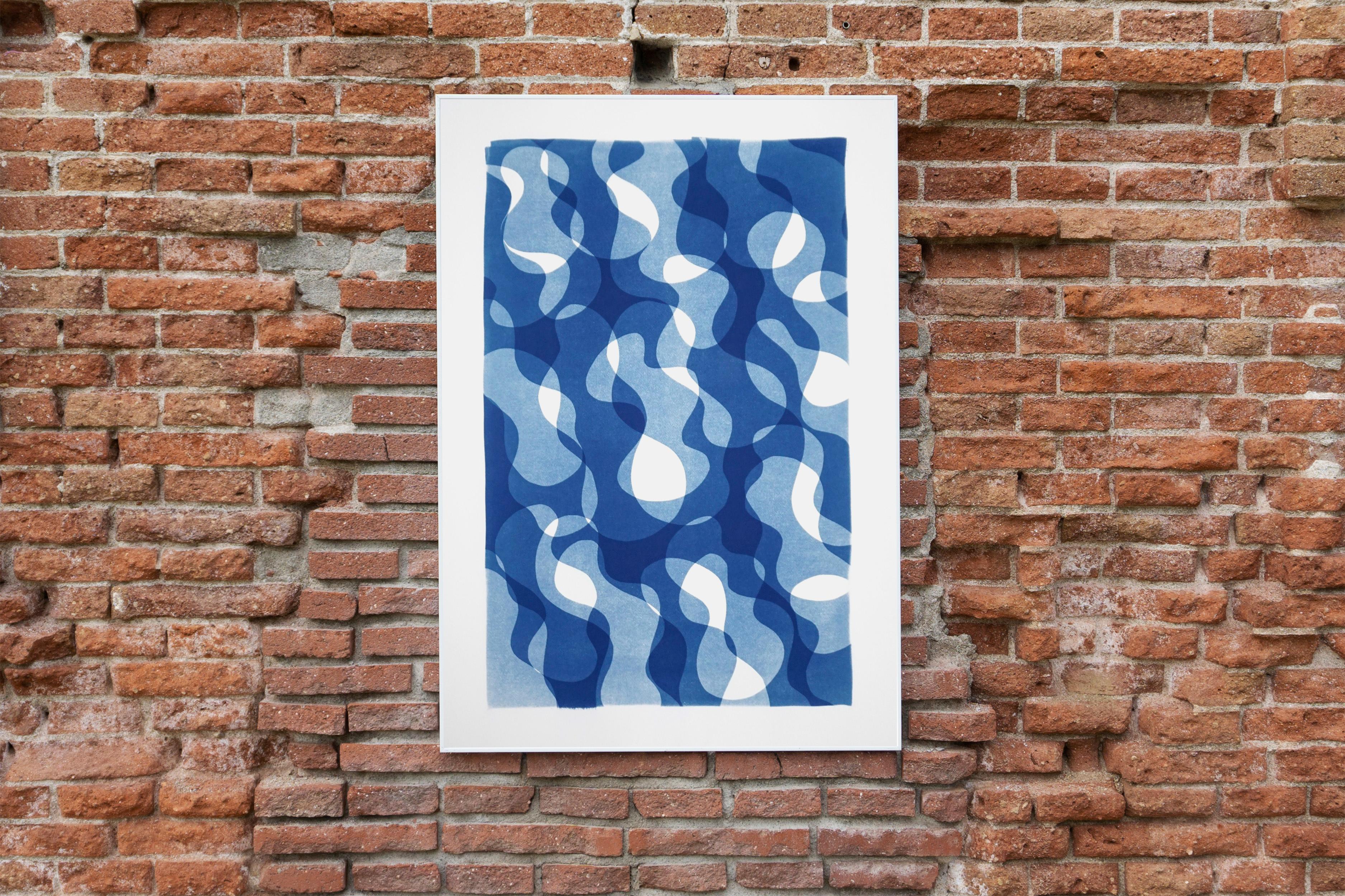 This is an exclusive handprinted unique cyanotype that takes its inspiration from the mid-century modern shapes.
It's made by layering paper cutouts and different exposures using uv-light. 

Details:
+ Title: Geometric Water Movement I
+ Year:
