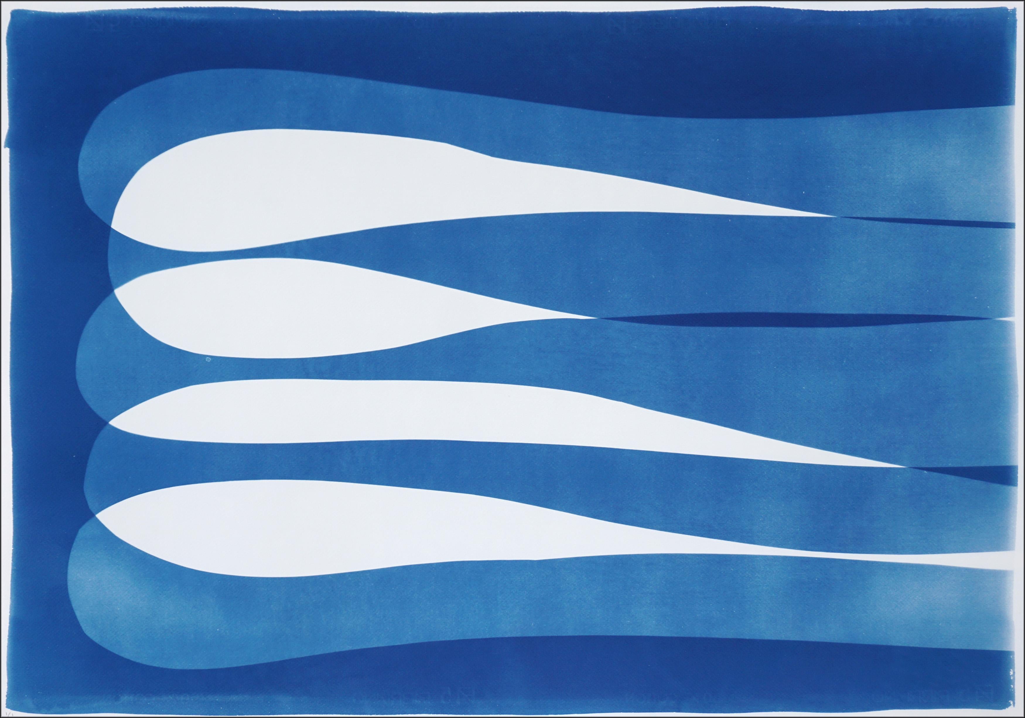 This is an exclusive handprinted unique cyanotype that takes its inspiration from the mid-century modern minimalist shapes.
