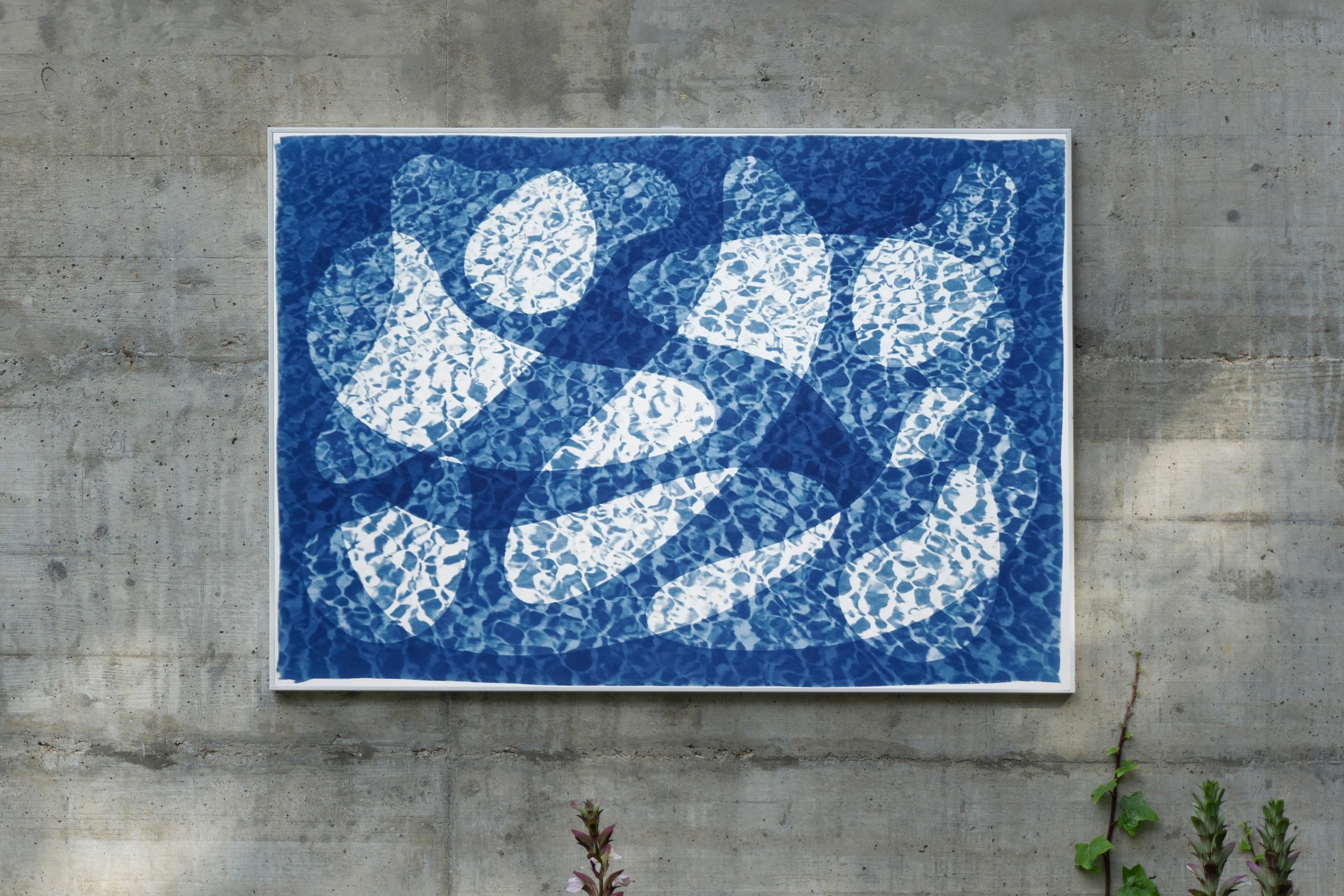 This is an exclusive handprinted unique cyanotype that takes its inspiration from the mid-century modern shapes.
It's made by layering paper cutouts and different exposures using uv-light. 

Details:
+ Title: Fish Swimming Below Water I
+ Year: