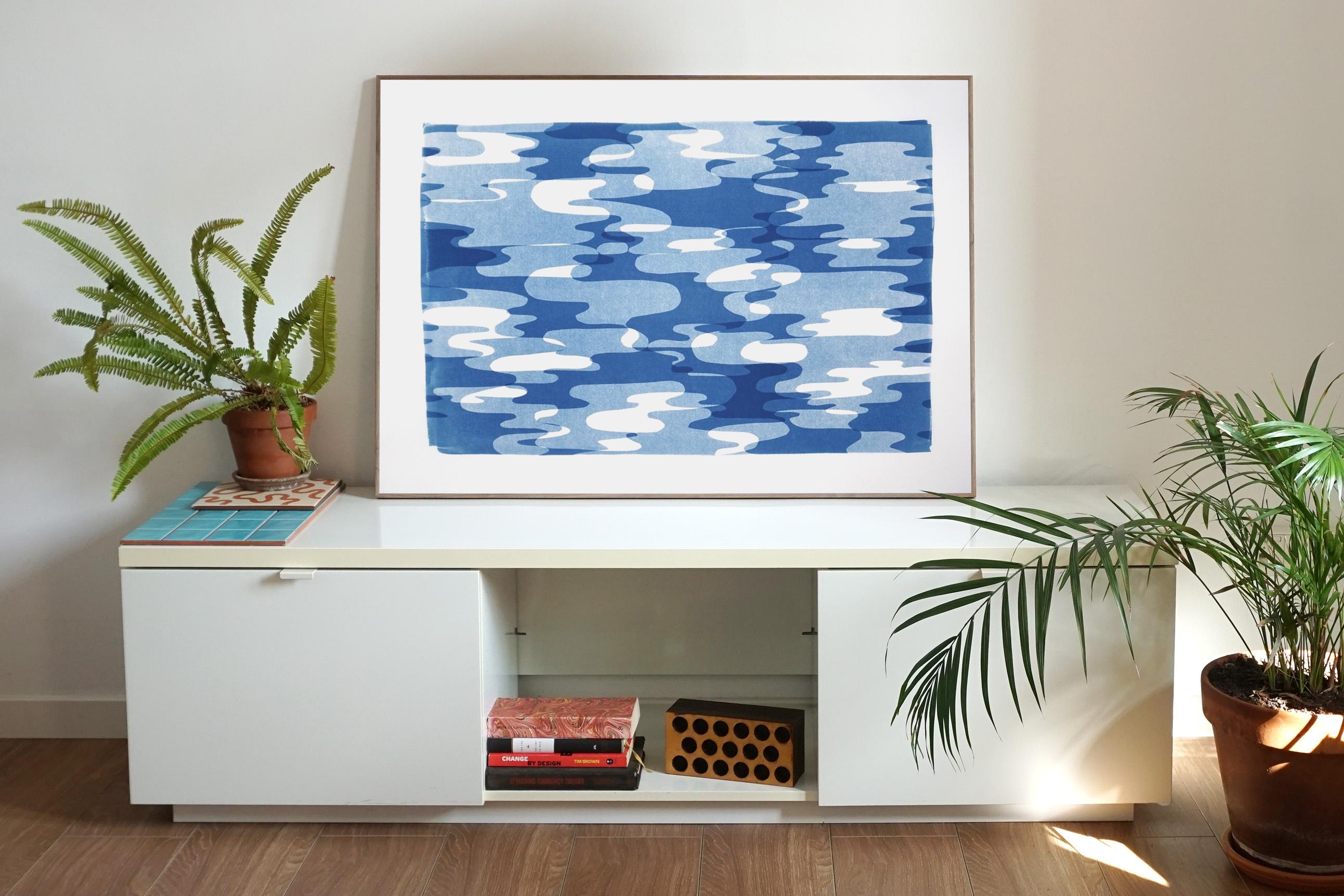 This is an exclusive handprinted unique cyanotype that takes its inspiration from mid-century modern shapes.
It's made by layering paper cutouts and different exposures using uv-light. 

Details:
+ Title: Geometric Water Reflections in Movement II
+