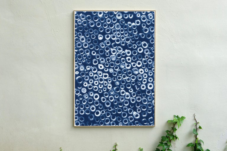 This is an exclusive handprinted limited edition cyanotype of a beautiful pile of cut bamboo circles.

Details:
+ Title: Cut Bamboo Circles 
+ Year: 2021
+ Edition Size: 100
+ Stamped and Certificate of Authenticity provided
+ Measurements : 70x100
