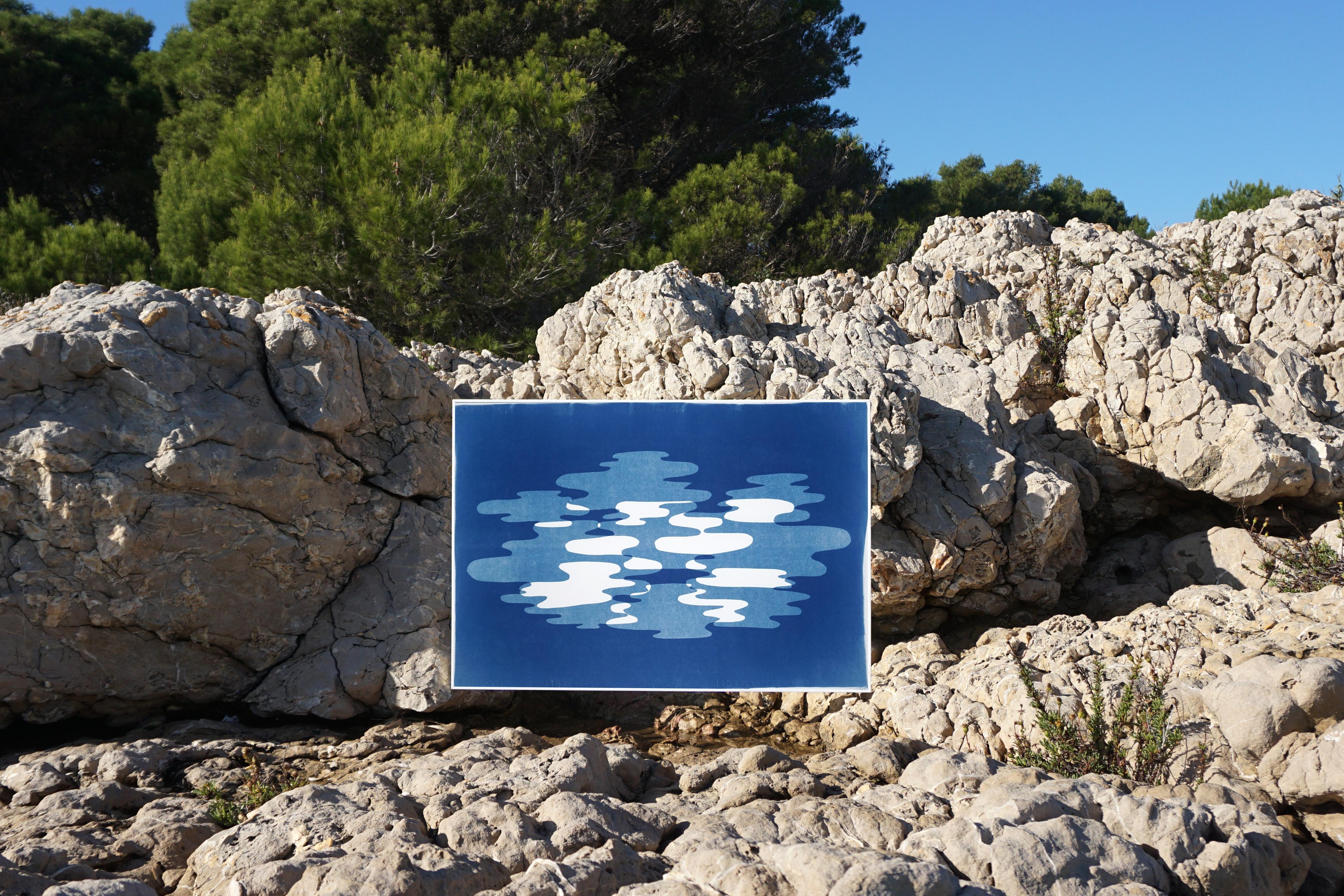 This is an exclusive handprinted unique cyanotype that takes its inspiration from the mid-century modern shapes.
It's made by layering paper cutouts and different exposures using uv-light. 

Details:
+ Title: Hazy Blue Smoke
+ Year: 2020
+ Stamped