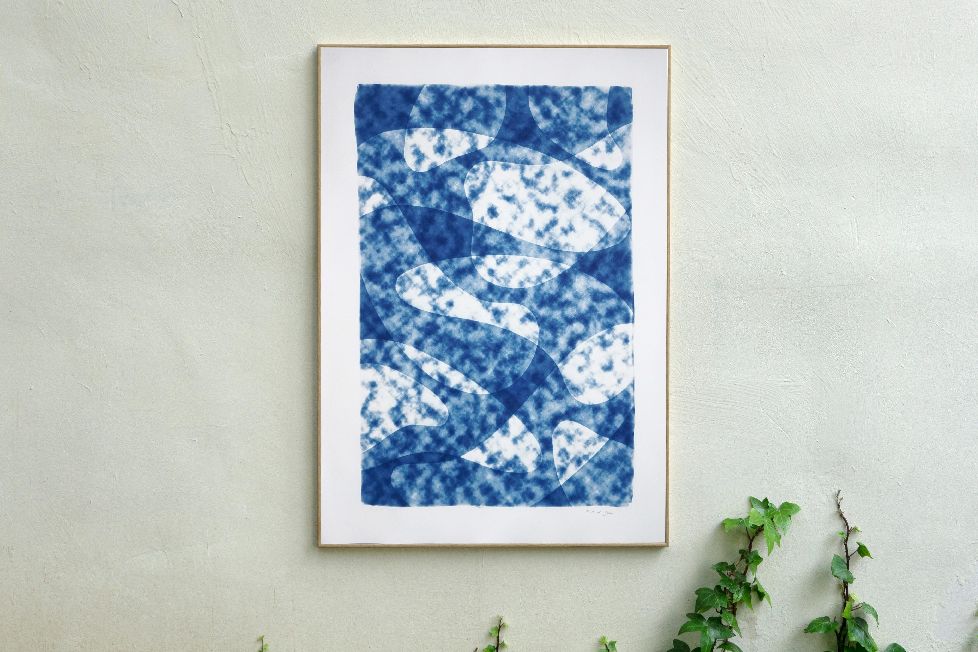 This is an exclusive handprinted unique cyanotype that takes its inspiration from the mid-century modern shapes.
It's made by layering paper cutouts and different exposures using uv-light. 

Details:
+ Title: Looking Up at the Clouds
+ Year: 2021
+