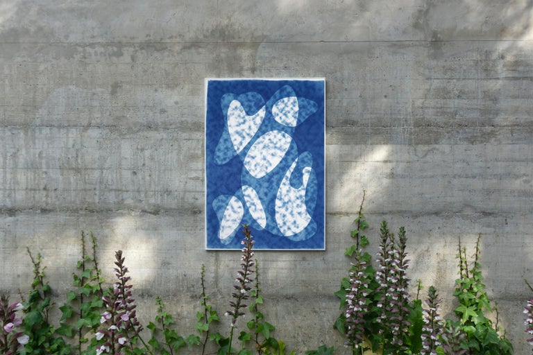 This is an exclusive handprinted unique cyanotype that takes its inspiration from the mid-century modern shapes.
It's made by layering paper cutouts and different exposures using uv-light. 

Details:
+ Title: Dark Cloudy Shapes 
+ Year: 2021
+