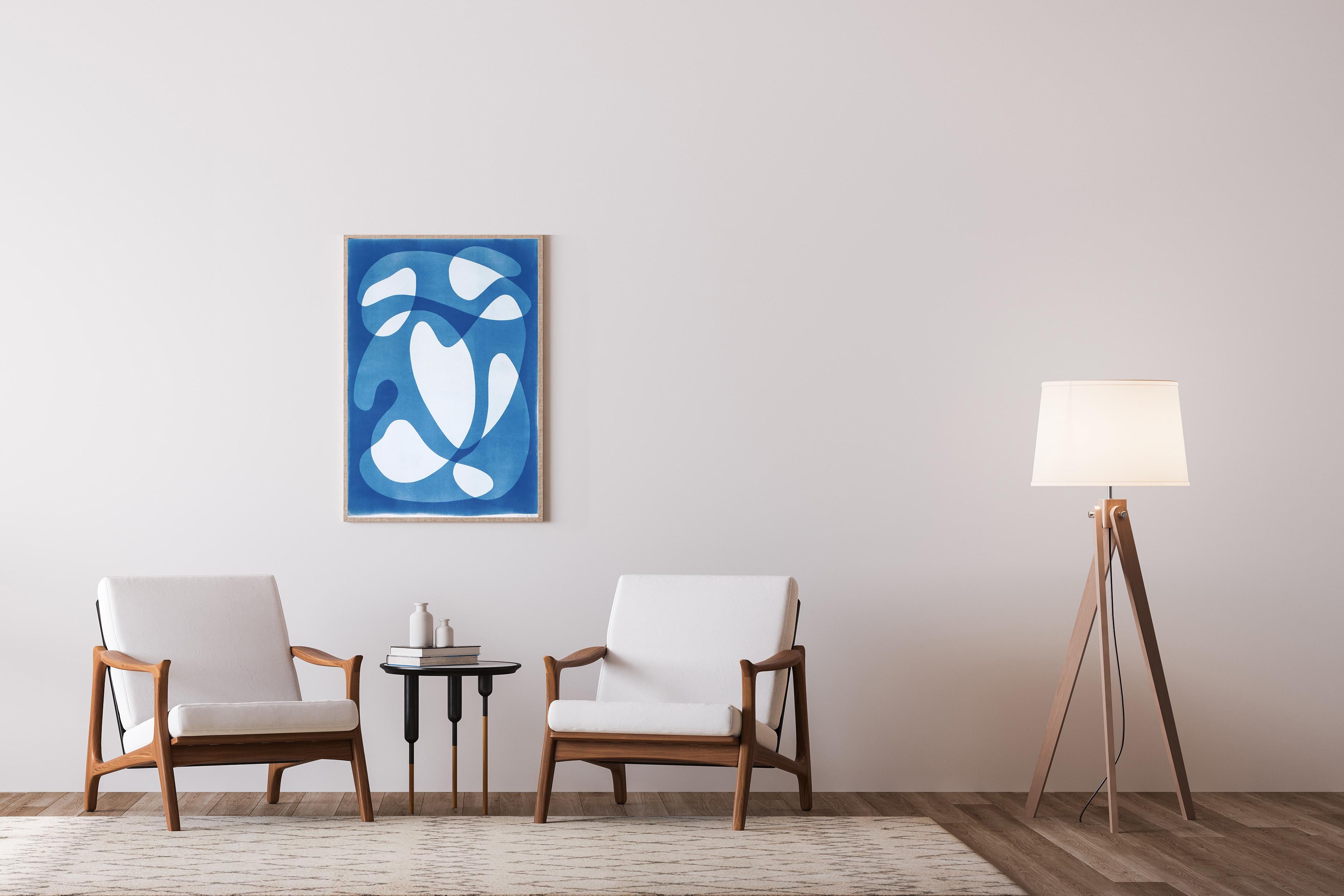 This is an exclusive handprinted unique cyanotype that takes its inspiration from the mid-century modern shapes.
It's made by layering paper cutouts and different exposures using uv-light. 

Details:
+ Title: Mid-Century Shapes IV
+ Year: 2024
+