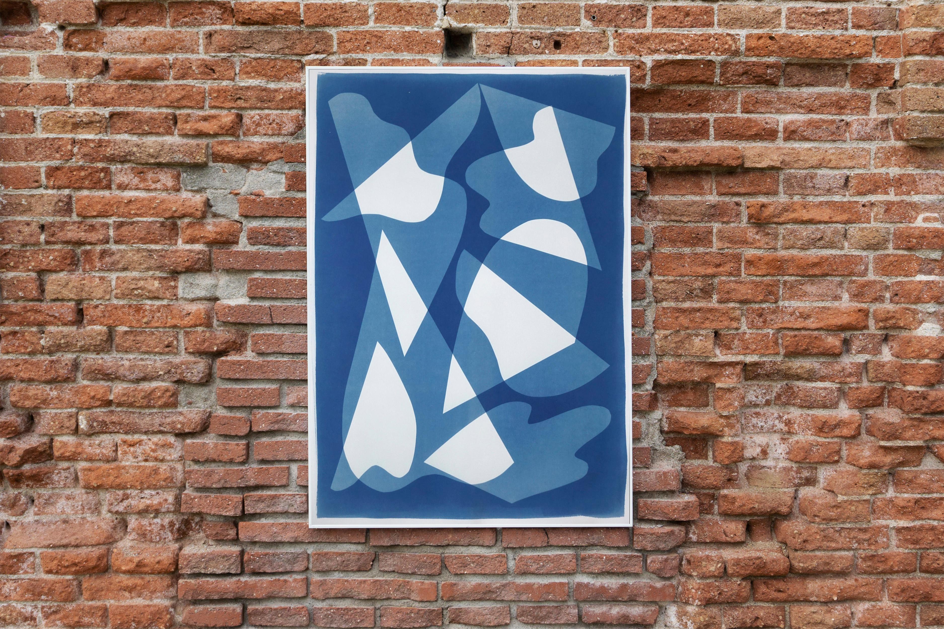 This is an exclusive handprinted unique cyanotype that takes its inspiration from the mid-century modern shapes.
It's made by layering paper cutouts and different exposures using uv-light. 

Details:
+ Title: Mirrors Under Water
+ Year: 2021
+