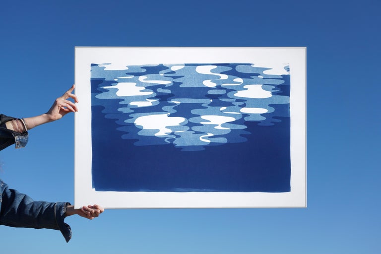 This is an exclusive handprinted unique cyanotype that takes its inspiration from mid-century modern shapes.
It's made by layering paper cutouts and different exposures using uv-light. 

Details:
+ Title: Moonlight Reflections Contours
+ Year: