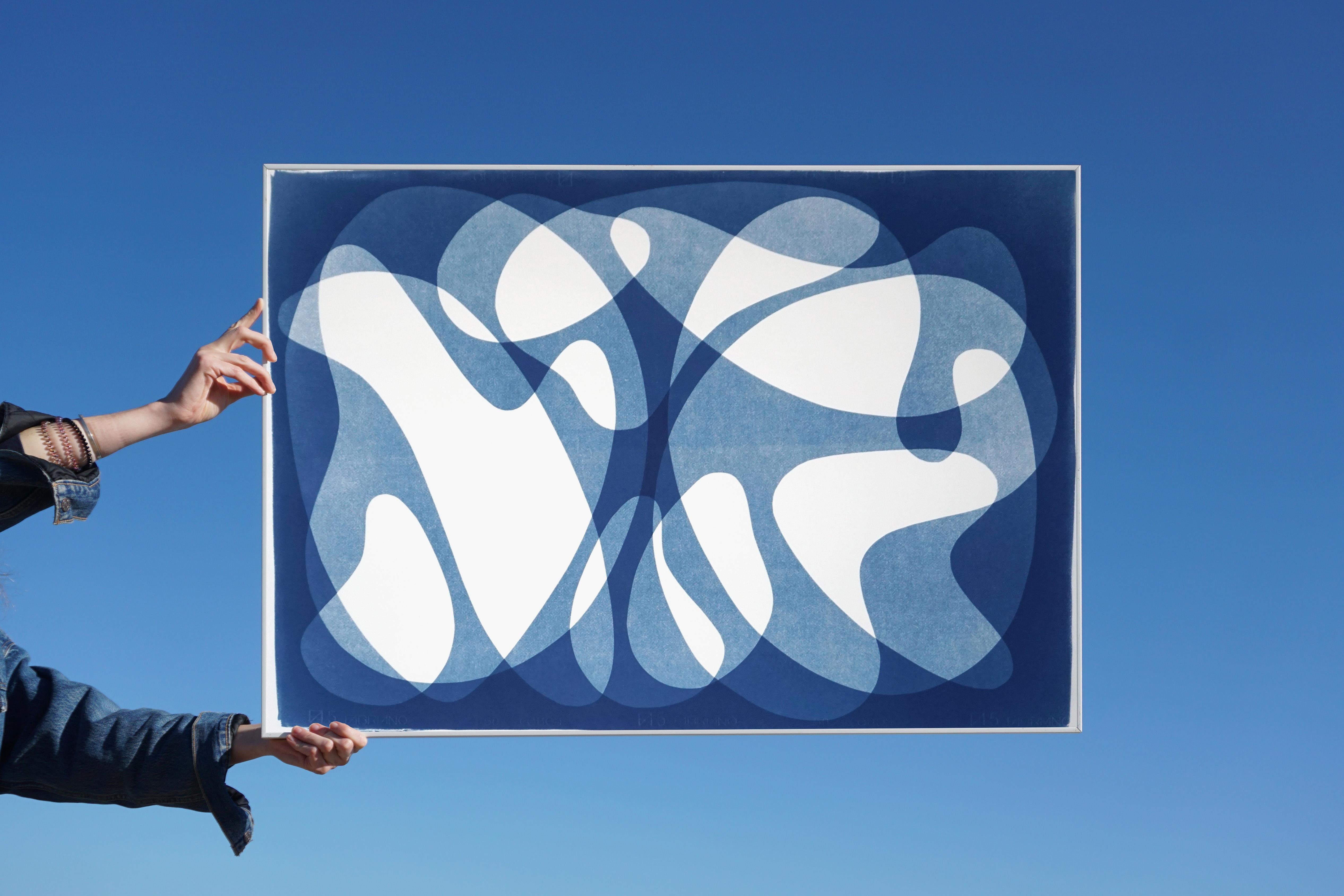 This is an exclusive handprinted unique cyanotype that takes its inspiration from the mid-century modern shapes.
It's made by layering paper cutouts and different exposures using uv-light. 

Details:
+ Title: Two Bodies Back to Back
+ Year: 2021
+