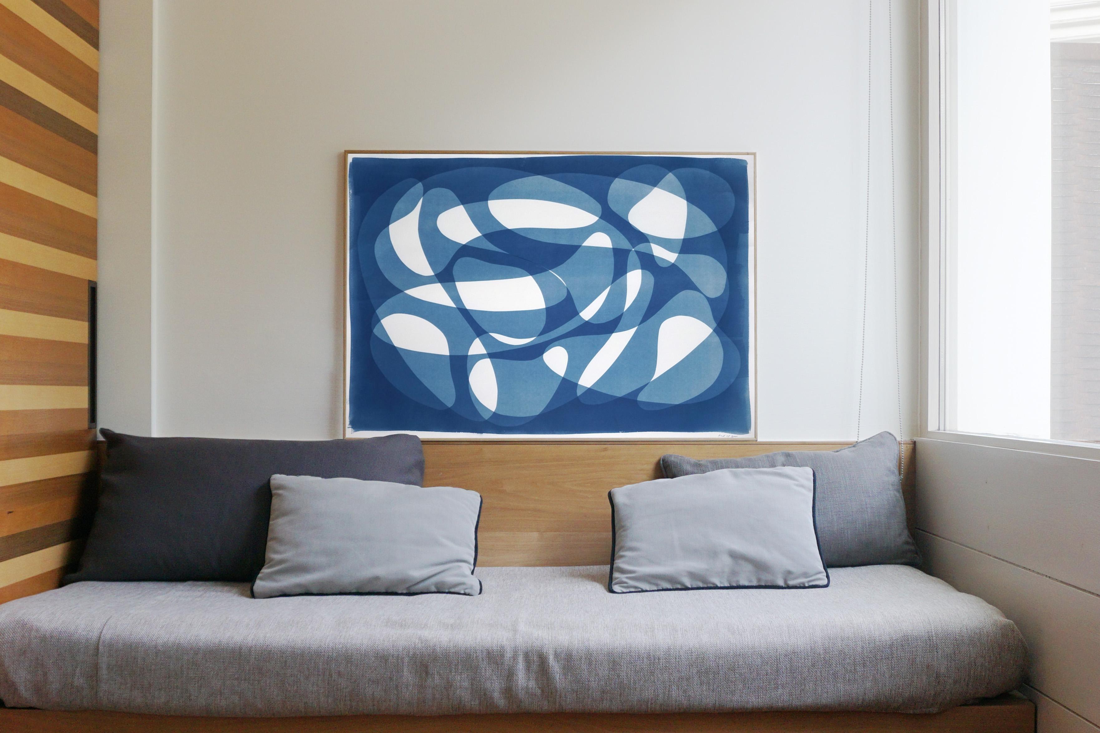 This is an exclusive handprinted unique cyanotype that takes its inspiration from the mid-century modern shapes.
It's made by layering paper cutouts and different exposures using uv-light. 

Details:
+ Title: Underwater Whirlpool 
+ Year: 2021
+