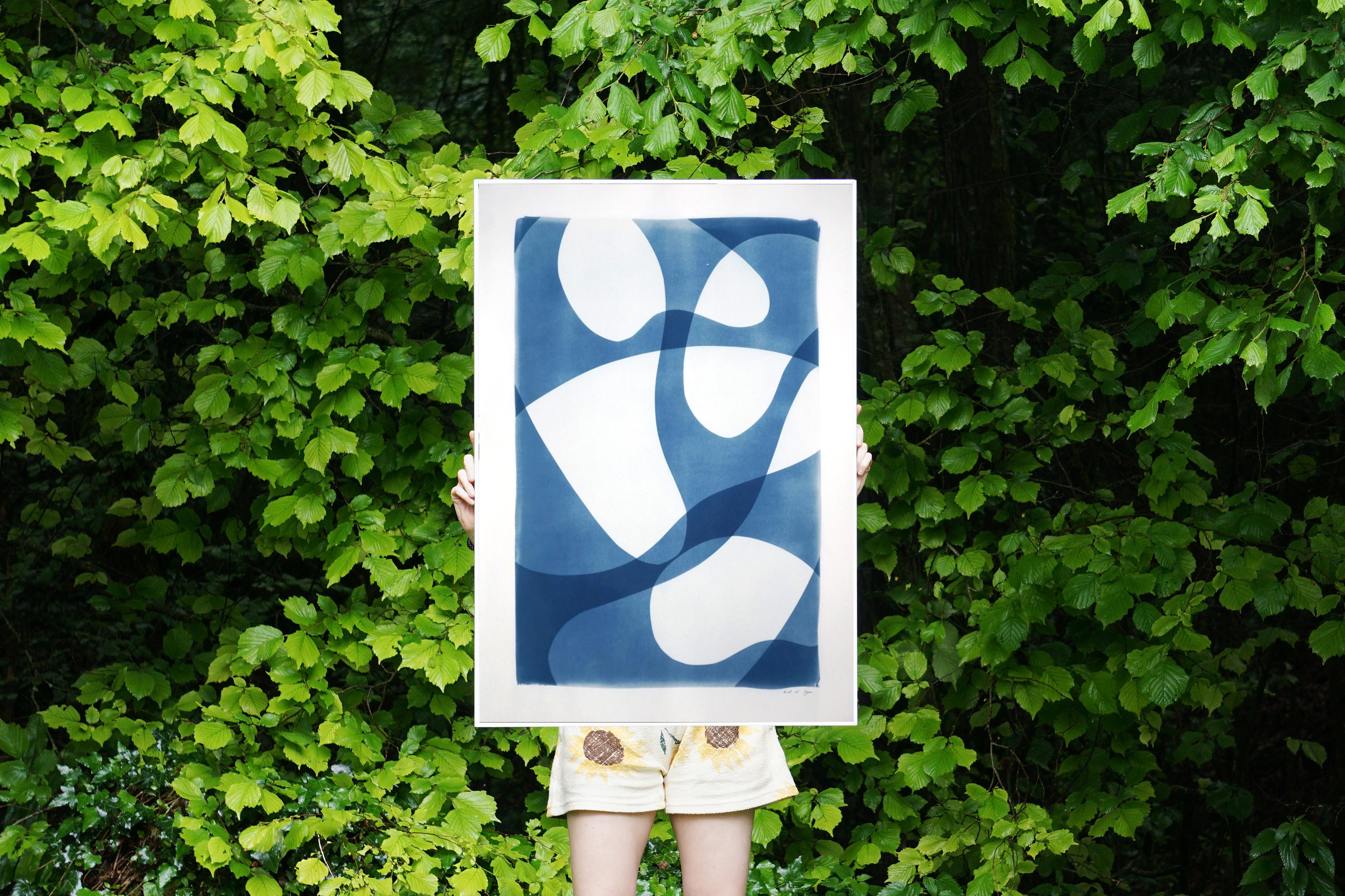 This is an exclusive handprinted unique cyanotype that takes its inspiration from the mid-century modern shapes.
It's made by layering paper cutouts and different exposures using uv-light. 

Details:
+ Title: Ghostly Pool Shapes 
+ Year: 2021
+