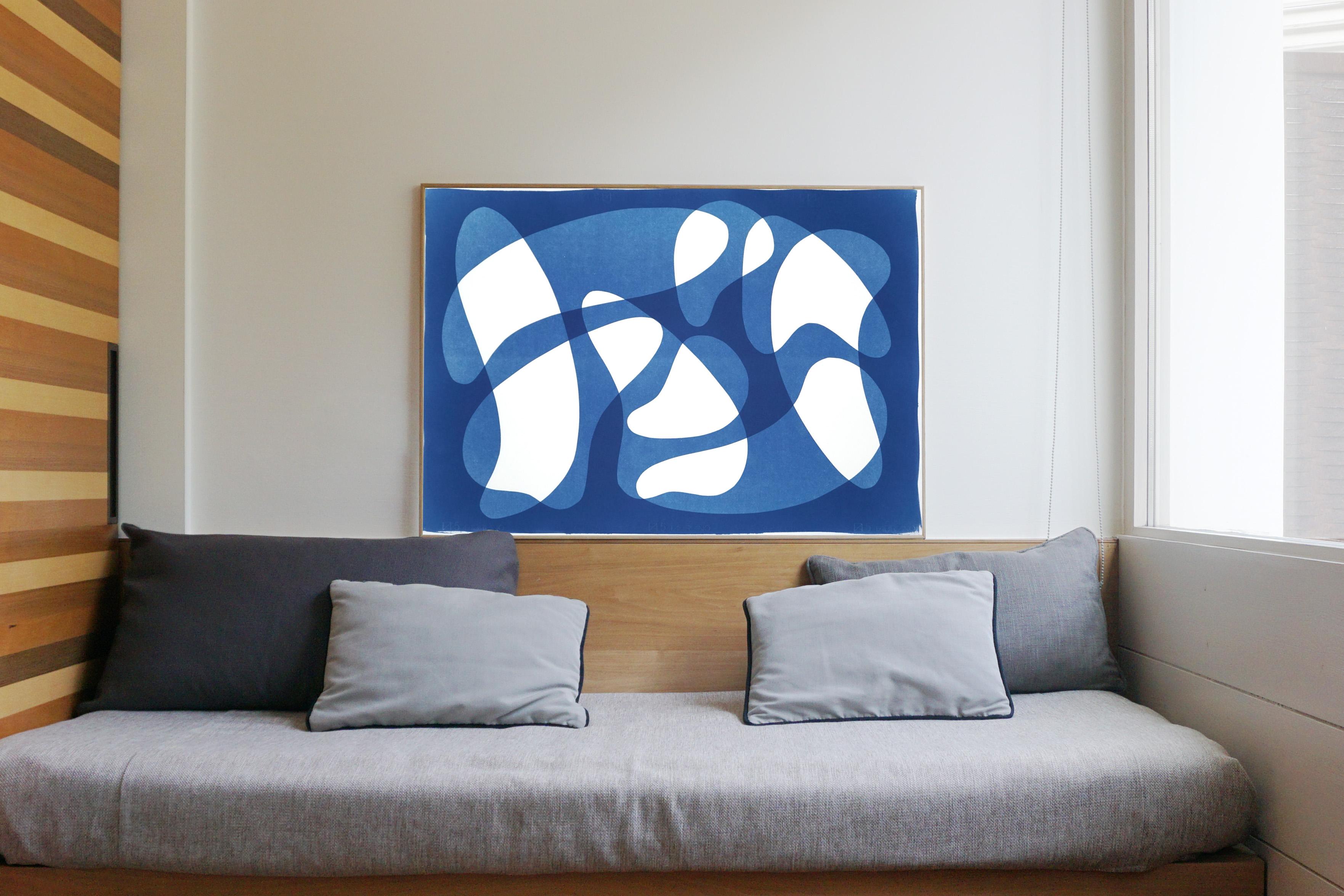 This is an exclusive handprinted unique cyanotype that takes its inspiration from the mid-century modern shapes.
It's made by layering paper cutouts and different exposures using uv-light. 

Details:
+ Title: Vanguard Shapes and Shadows I 
+ Year: