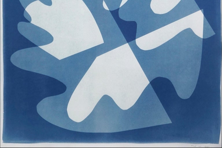 This is an exclusive handprinted unique cyanotype that takes its inspiration from the mid-century modern shapes.
It's made by layering paper cutouts and different exposures using uv-light. 

Details:
+ Title: Walking on Glass
+ Year: 2021
+ Stamped