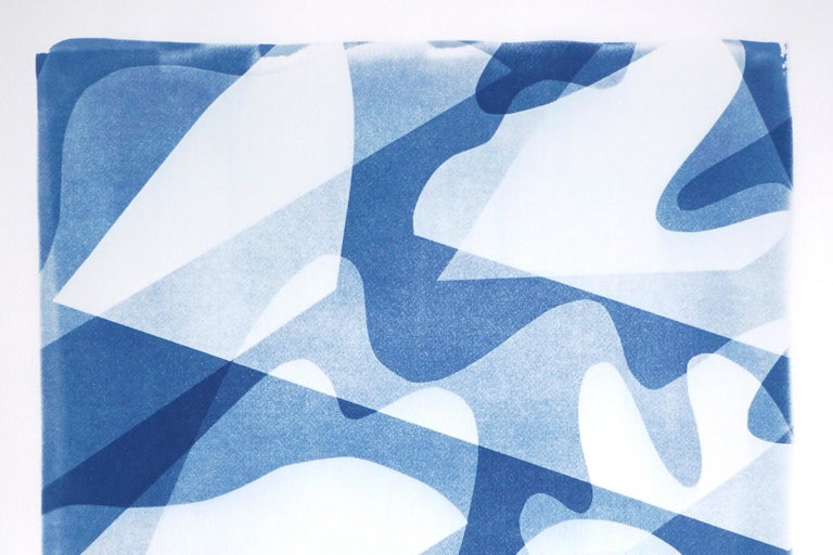 This is an exclusive handprinted unique cyanotype that takes its inspiration from the mid-century modern shapes.
It's made by layering paper cutouts and different exposures using uv-light. 

Details:
+ Title: Wind over Water
+ Year: 2022
+ Stamped