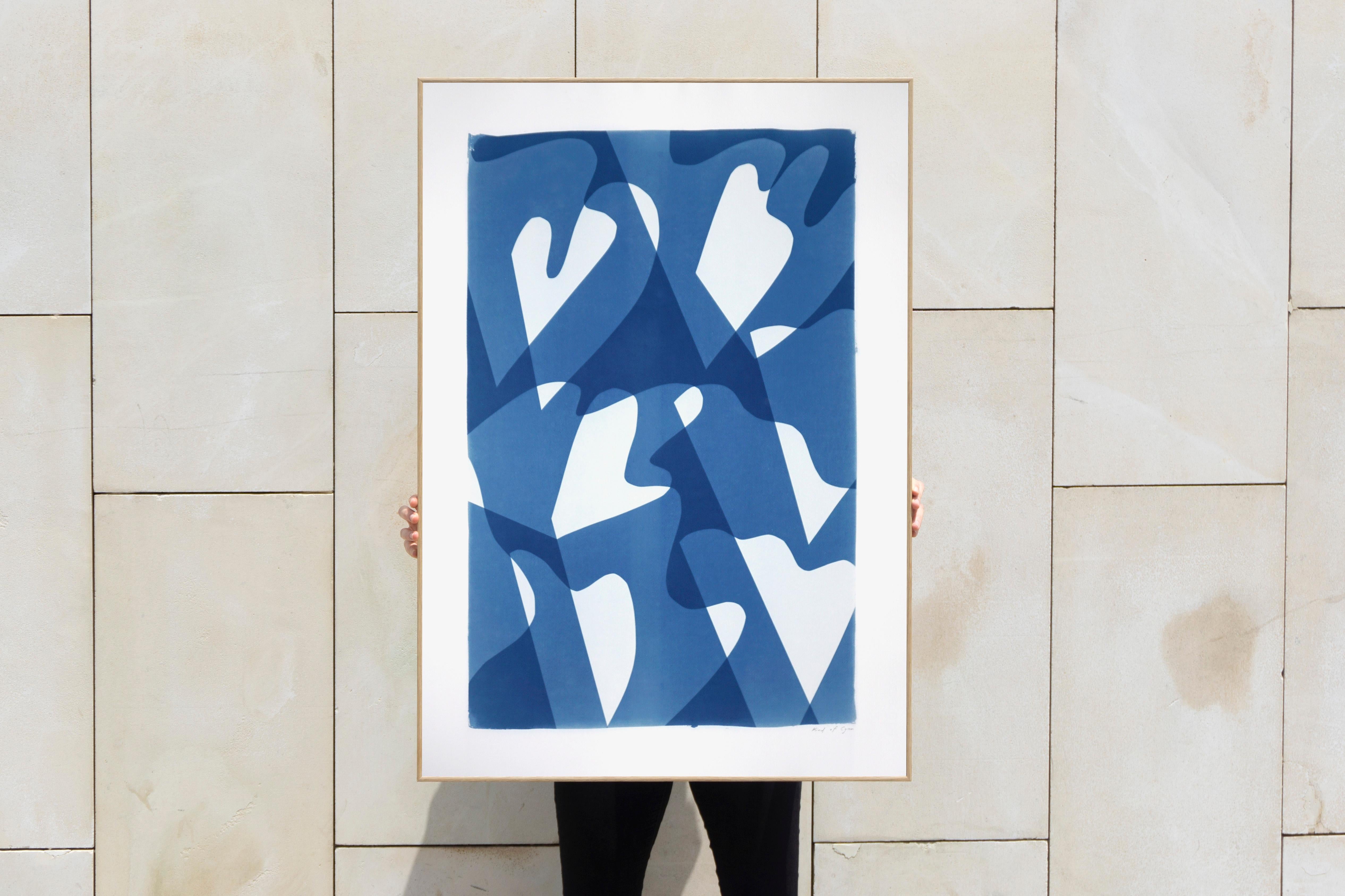 This is an exclusive handprinted unique cyanotype that takes its inspiration from the mid-century modern shapes.
It's made by layering paper cutouts and different exposures using uv-light. 

Details:
+ Title: Wind over Waters
+ Year: 2021
+ Stamped