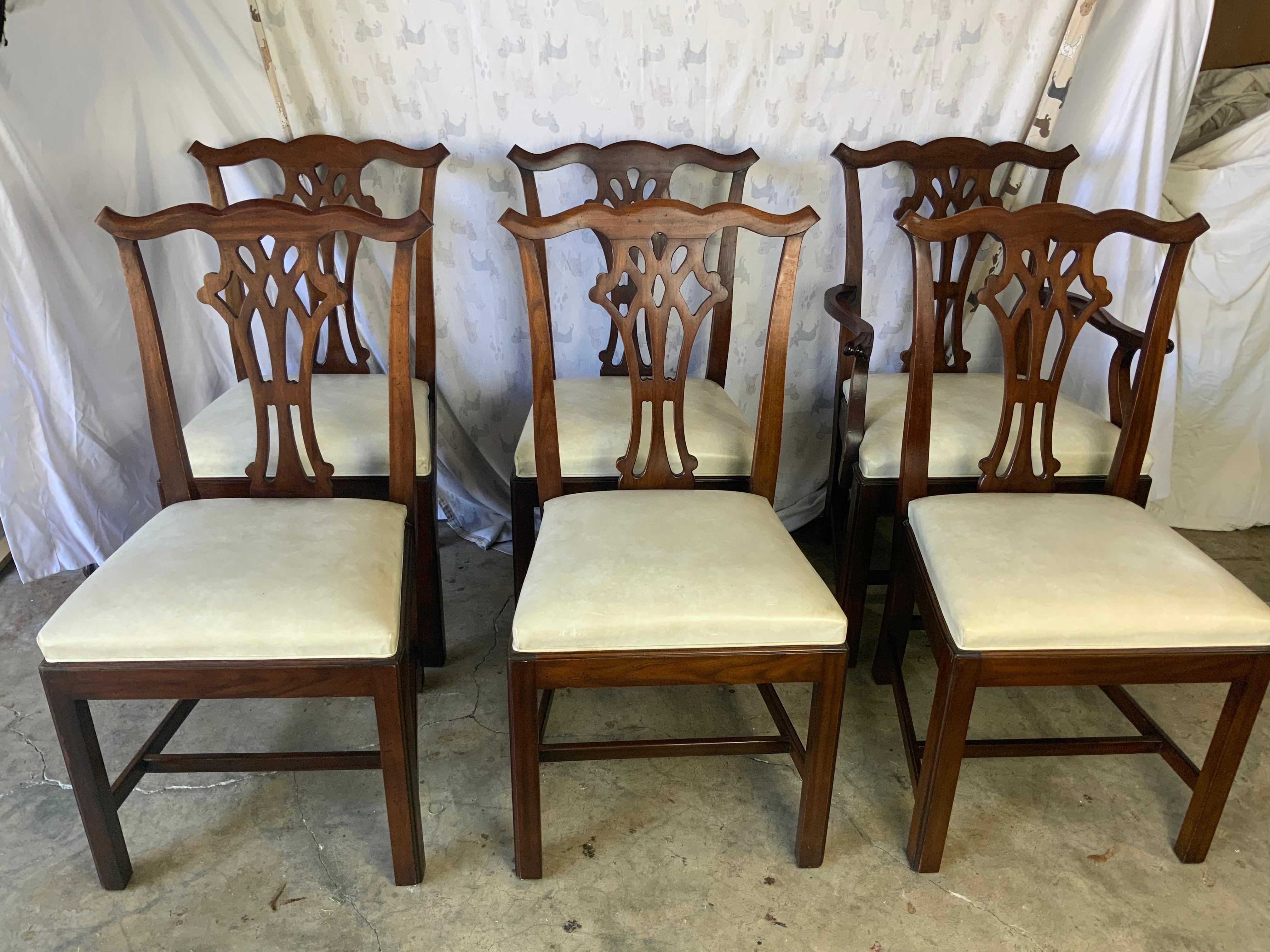 A very well kept set of six Kindel Chippendale style Cherry dining chairs consisting of one arm and five sides. These chairs are in very good original condition showing very minimal use and still retaining the original upholstered seats. No repairs