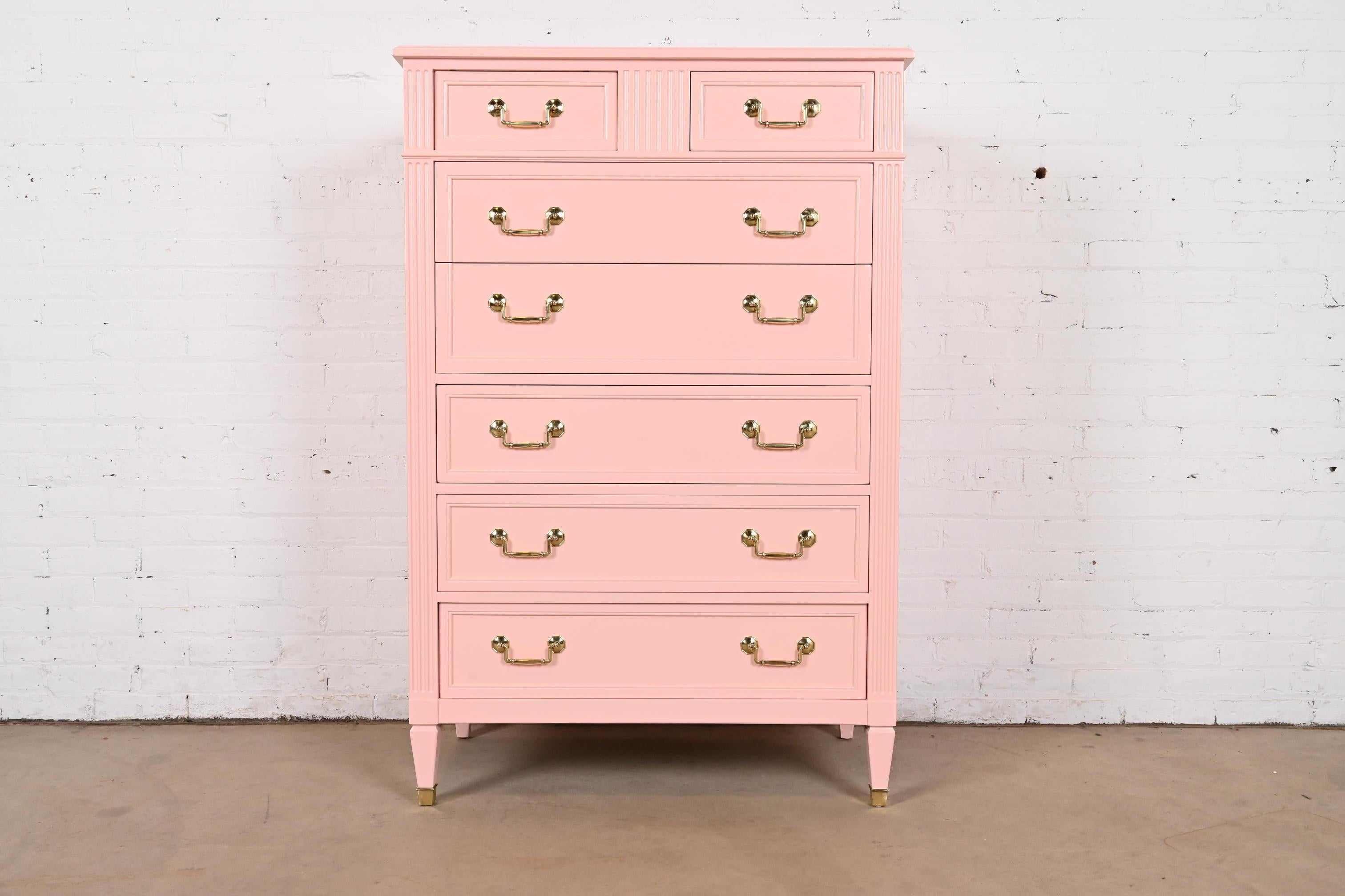 A gorgeous French Regency Louis XVI style seven-drawer highboy dresser

By Kindel Furniture

USA, Circa 1960s

Pink lacquered solid cherry wood, with original brass hardware.

Measures: 36.25