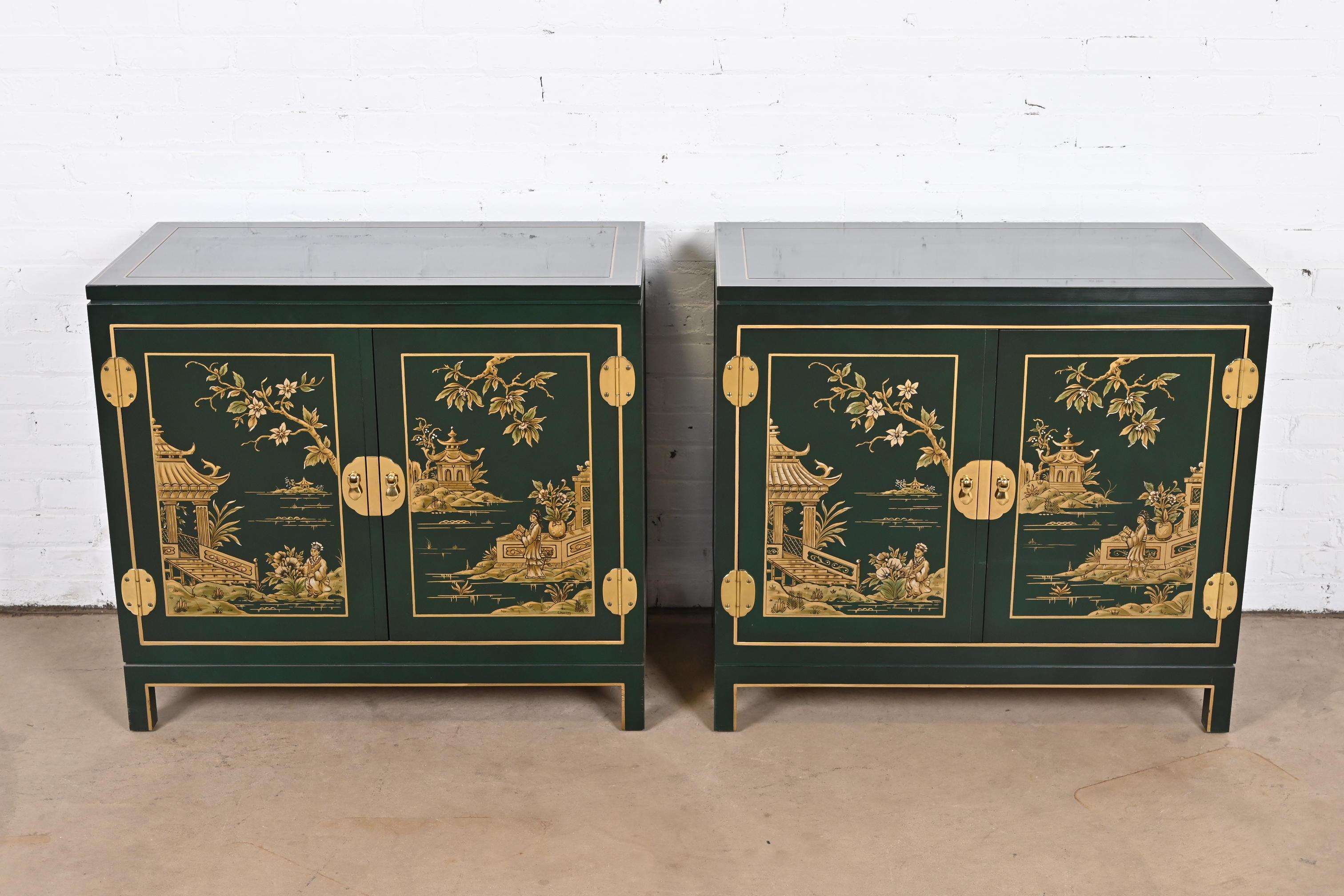 A gorgeous pair of Hollywood Regency Chinoiserie style commodes, cabinets, or bedside chests

By Kindel Furniture

USA, 1980s

Green lacquered mahogany, with gold gilt trim, brass hardware, and hand painted Asian scenes.

Each measures: 34