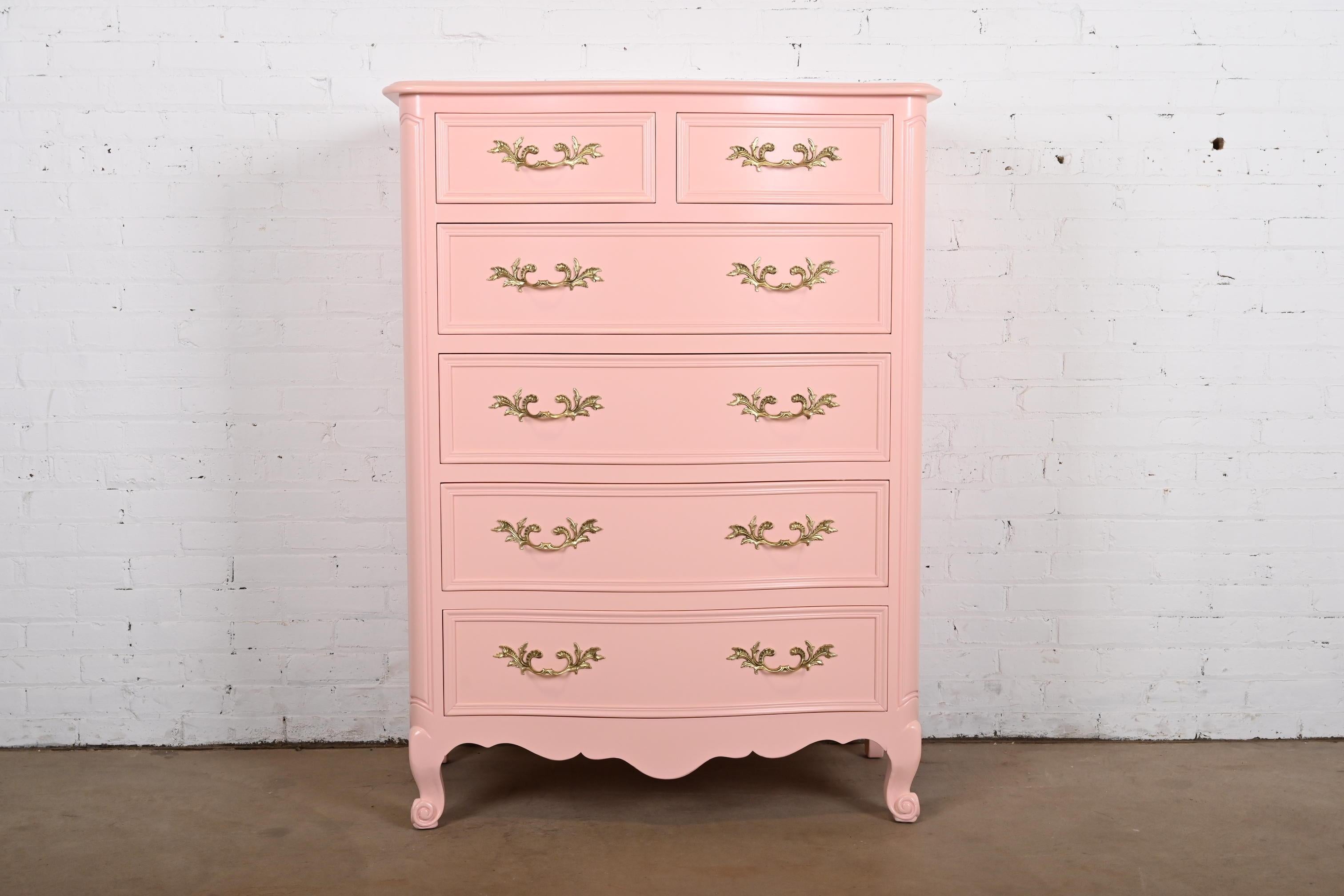 An exceptional French Provincial Louis XV style six-drawer highboy dresser or chest of drawers

By Kindel Furniture

USA, Circa 1960s

Pink lacquered solid cherry wood, with original brass hardware.

Measures: 38