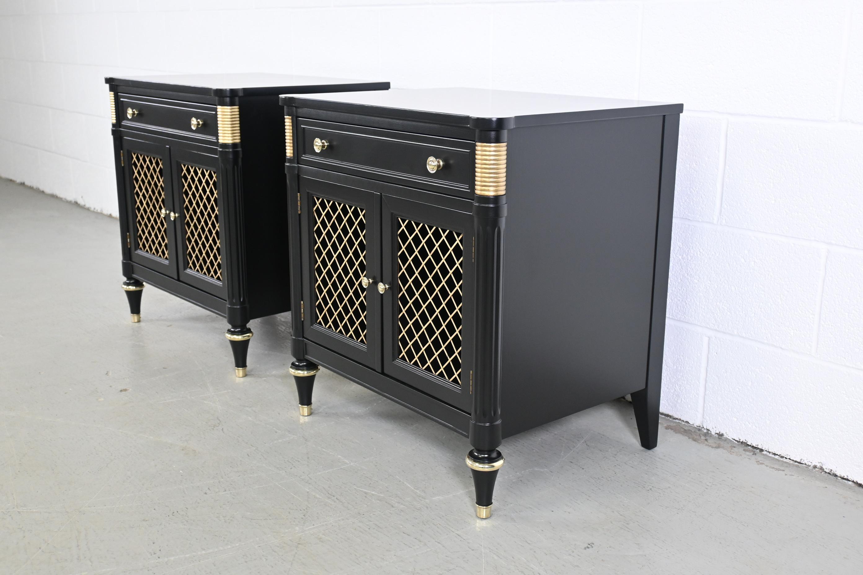 Kindel Furniture French Regency Black Lacquered Pair of Nightstands

Kindel Furniture, USA 1970s

23.75 Wide x 17.5 Deep x 25.25 High.

French regency style black lacquered nightstands with brass hardware and accents.

Professionally