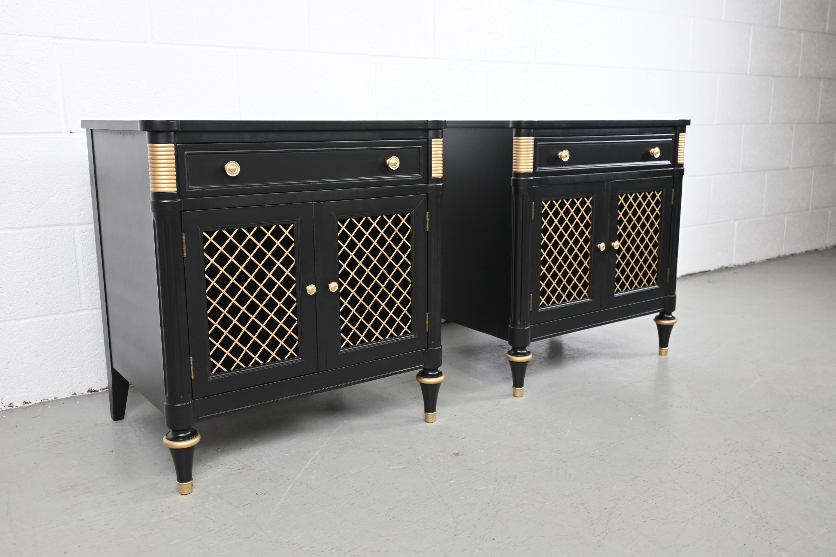 Kindel Furniture French Regency Black Lacquered Pair of Nightstands

Kindel Furniture, USA 1970s

Size: 23.75 Wide x 17.88 Deep x 25.13 High.

French regency style black lacquered nightstands with gold accents.

Professionally refinished.