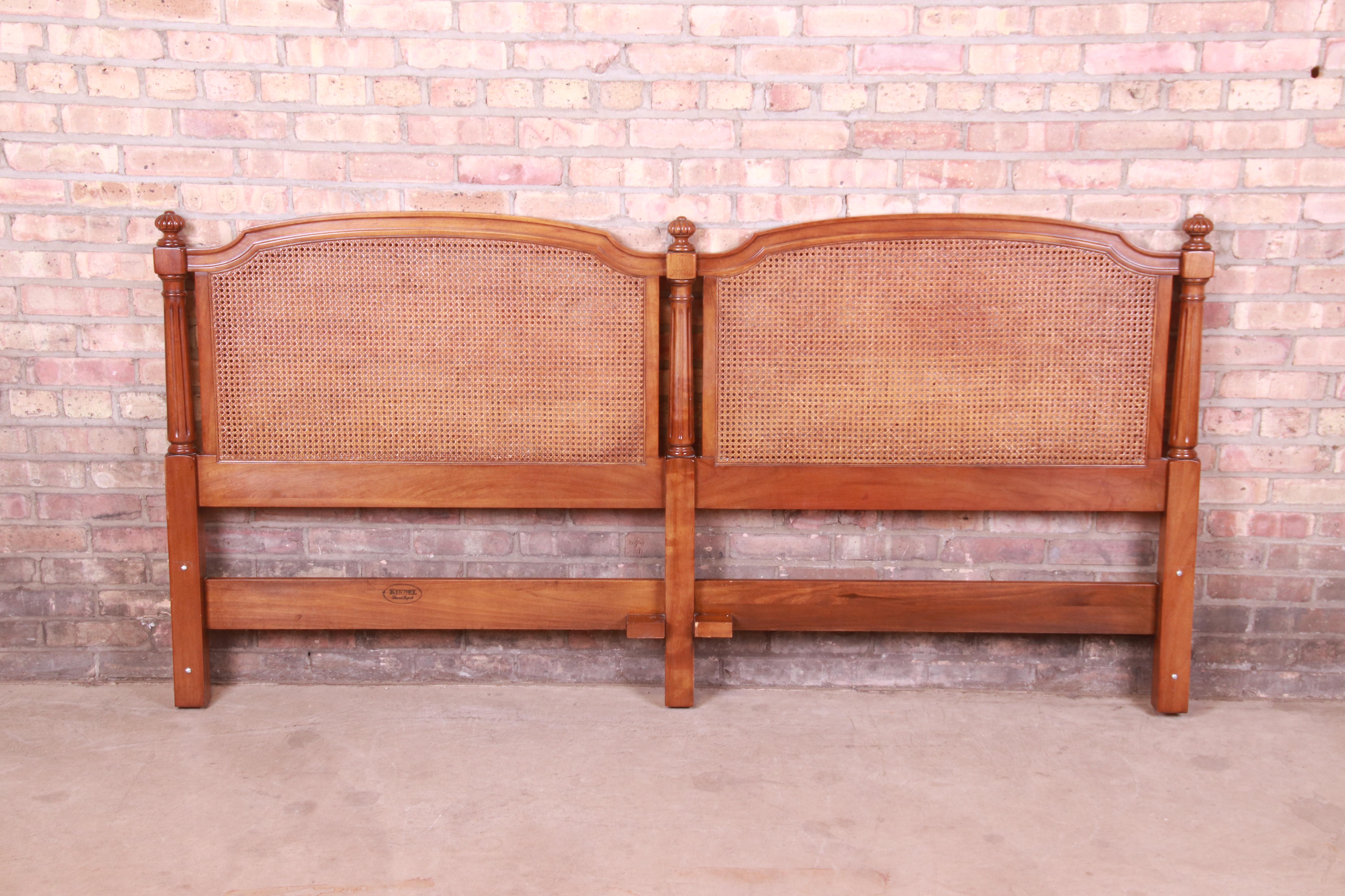 A gorgeous mid-century French Regency style king size headboard

By Kindel Furniture

USA, Circa 1960s

Carved cherry wood, with caned panels.

Measures: 79