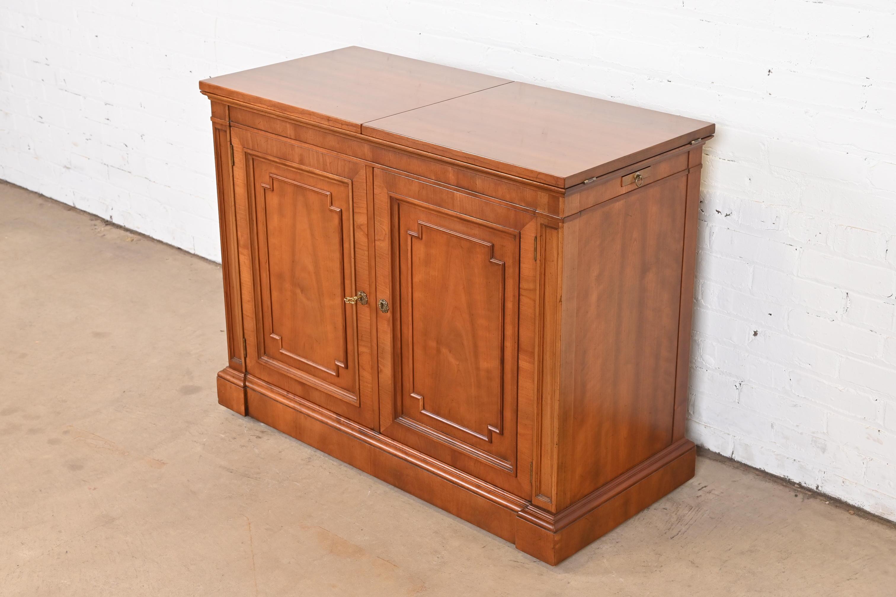 American Kindel Furniture French Regency Cherry Wood Flip Top Rolling Bar Cabinet For Sale
