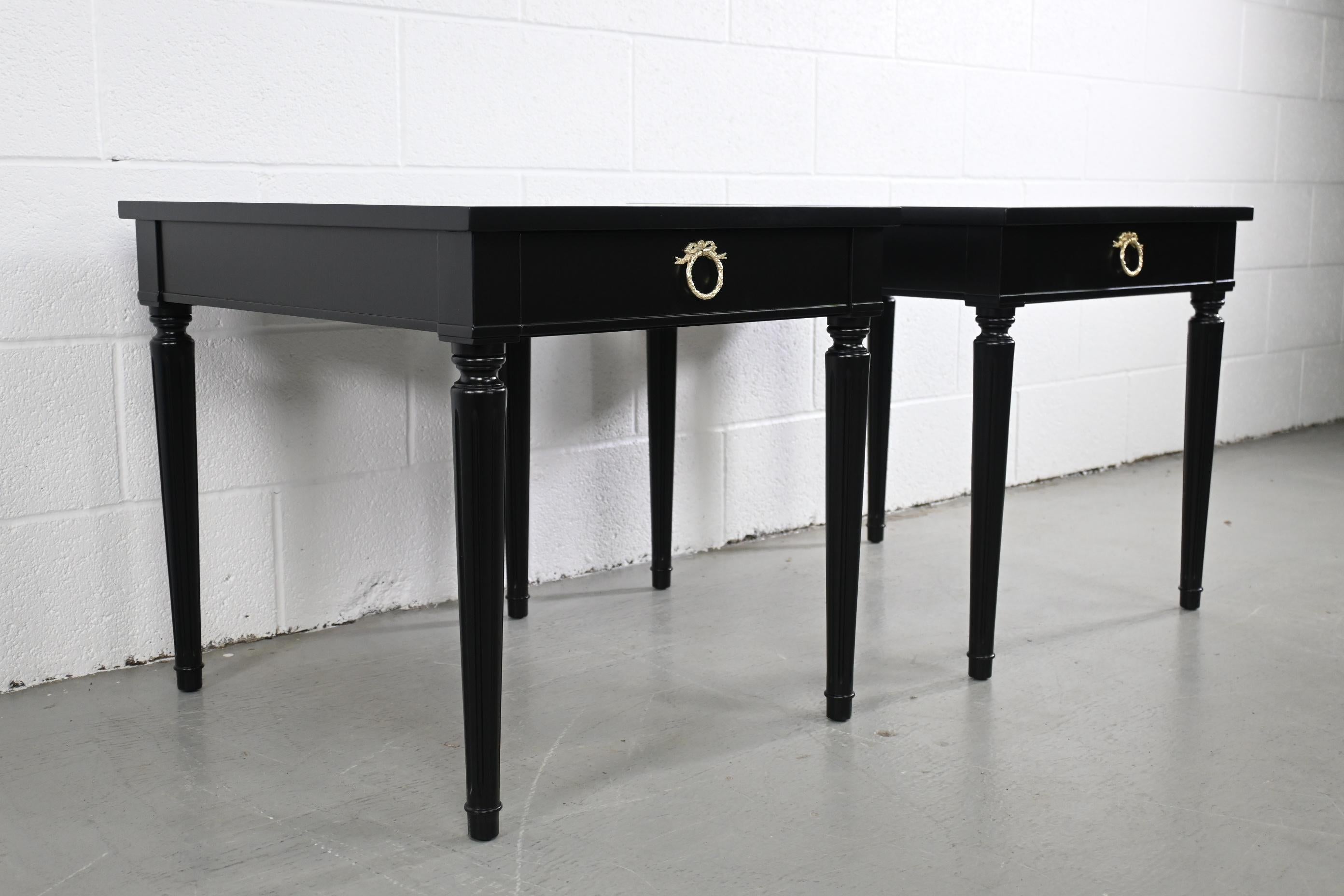 Kindel Furniture French Regency style black lacquered pair of end or side tables

Kindel Furniture, USA, 1980s

22 Wide x 26 Deep x 22.25 High

Pair of French Regency style black lacquered end or side tables with brass