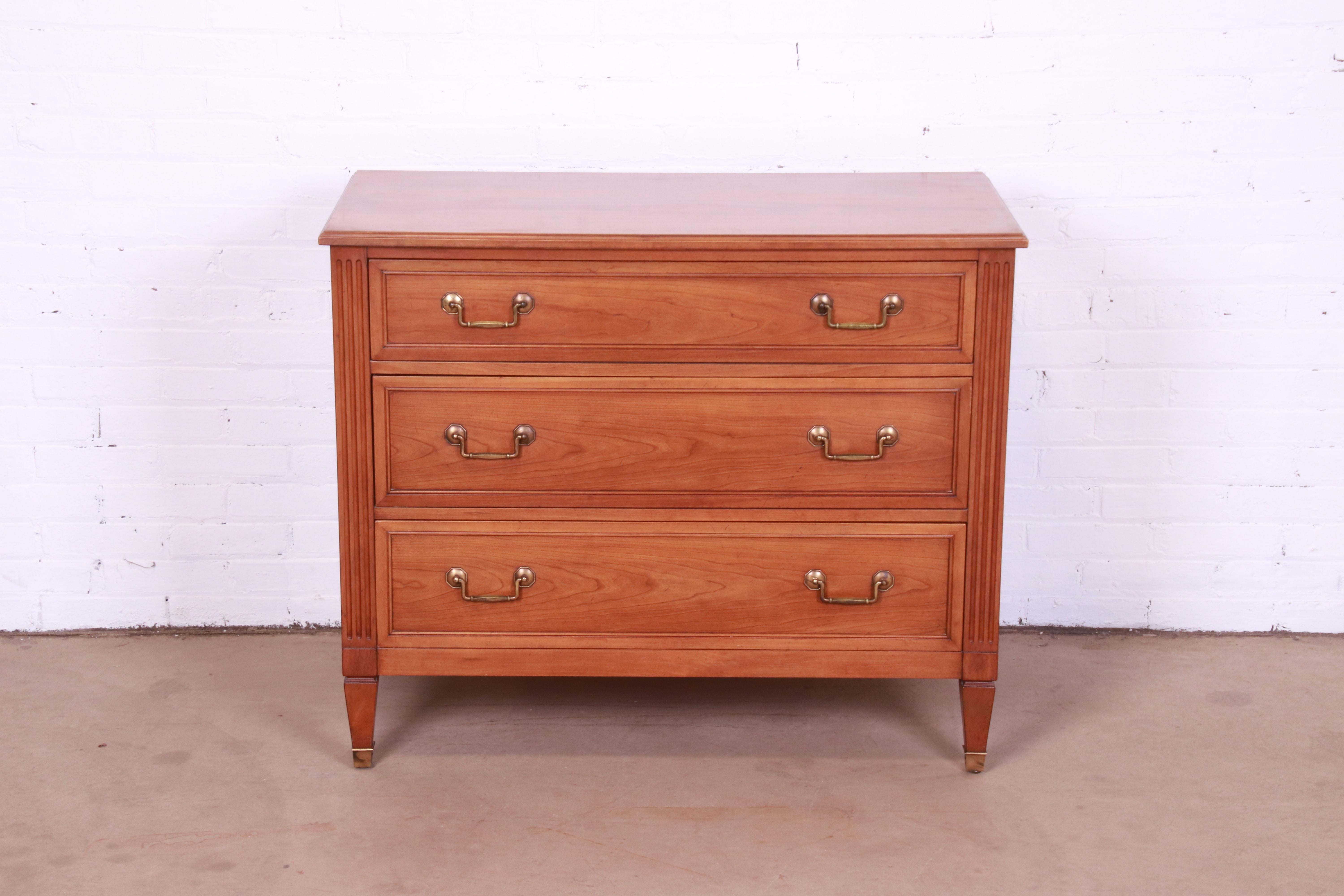 An exceptional French Regency Louis XVI style dresser or chest of drawers

By Kindel Furniture

USA, Circa 1960s

Solid cherry wood, with original brass hardware.

Measures: 40