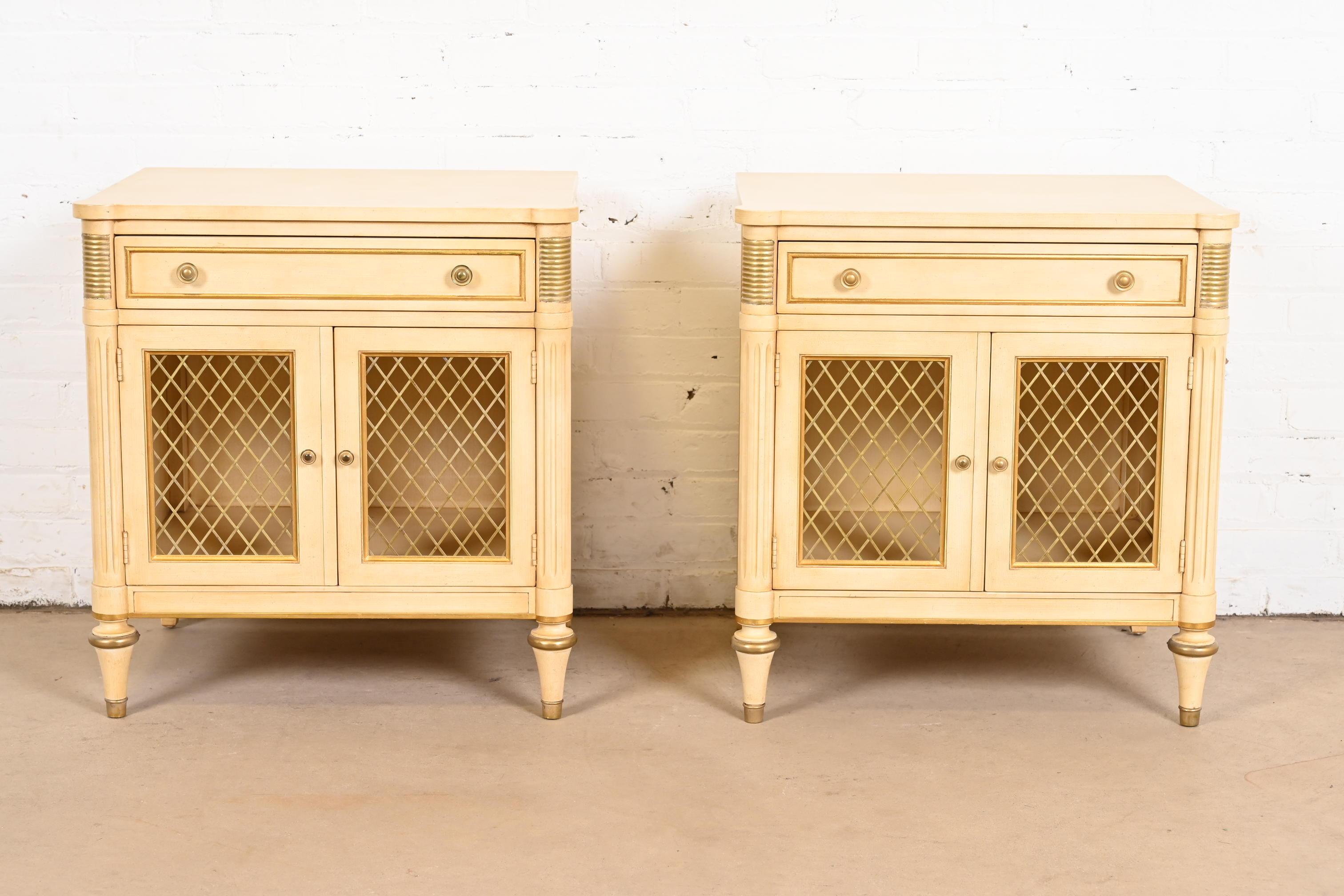 American Kindel Furniture French Regency Louis XVI Cream Lacquered Parcel Nightstands For Sale