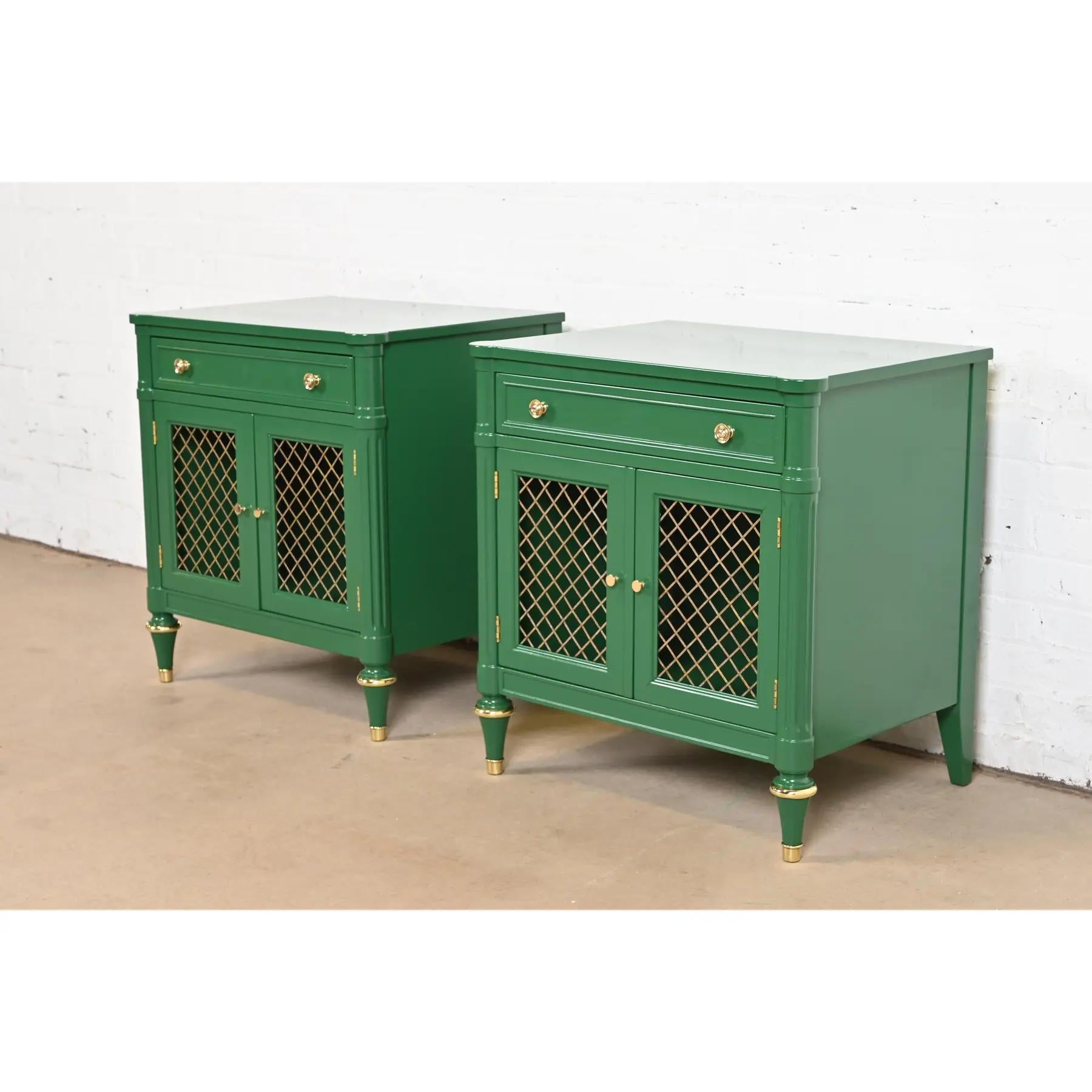 A gorgeous pair of mid-century French Regency Louis XVI style nightstands or end tables

By Kindel Furniture

USA, Circa 1960s

Carved solid cherry wood in green lacquer, with mounted brass details, and original brass hardware.

Each measures: