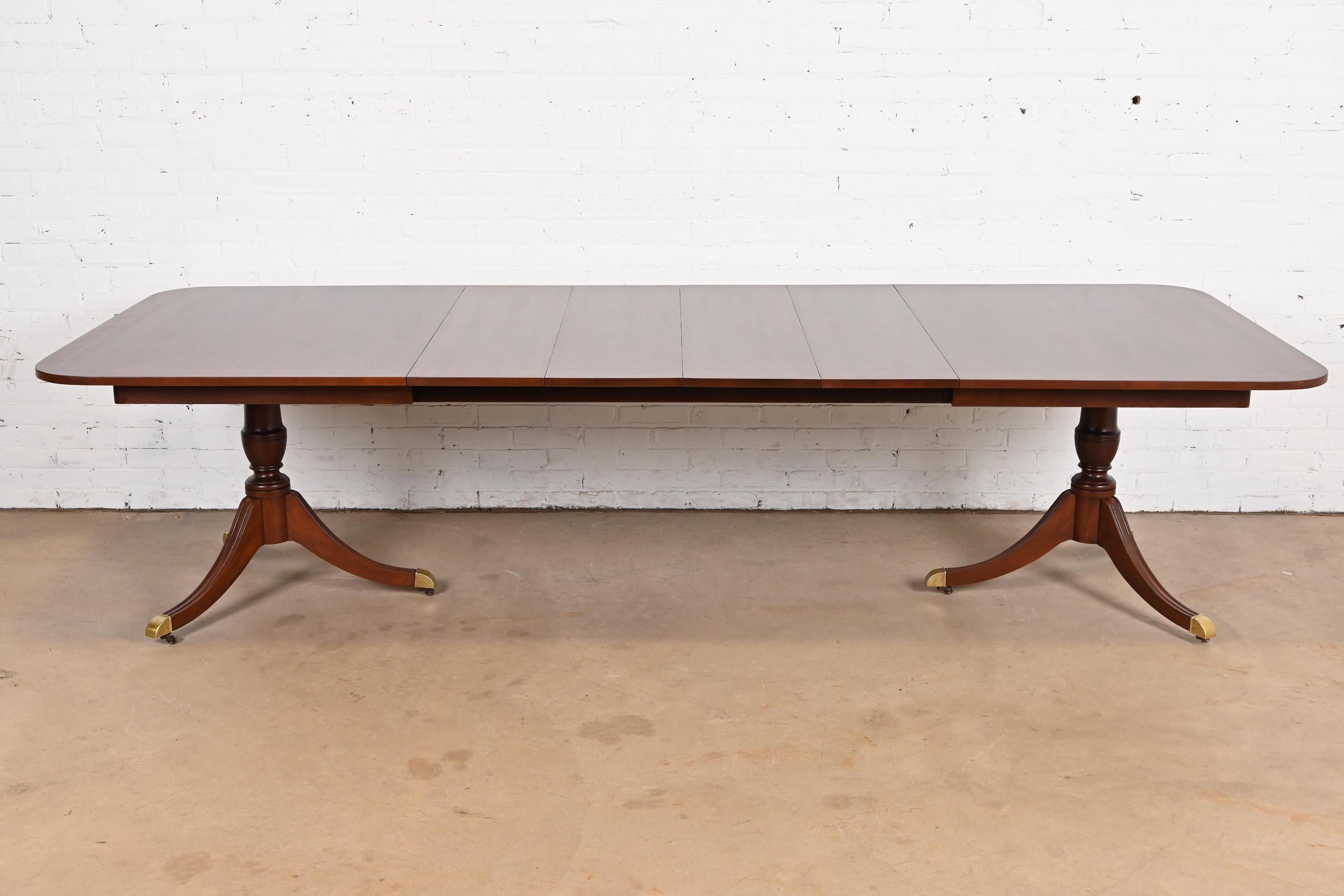 American Kindel Furniture Georgian Banded Mahogany Double Pedestal Extension Dining Table For Sale