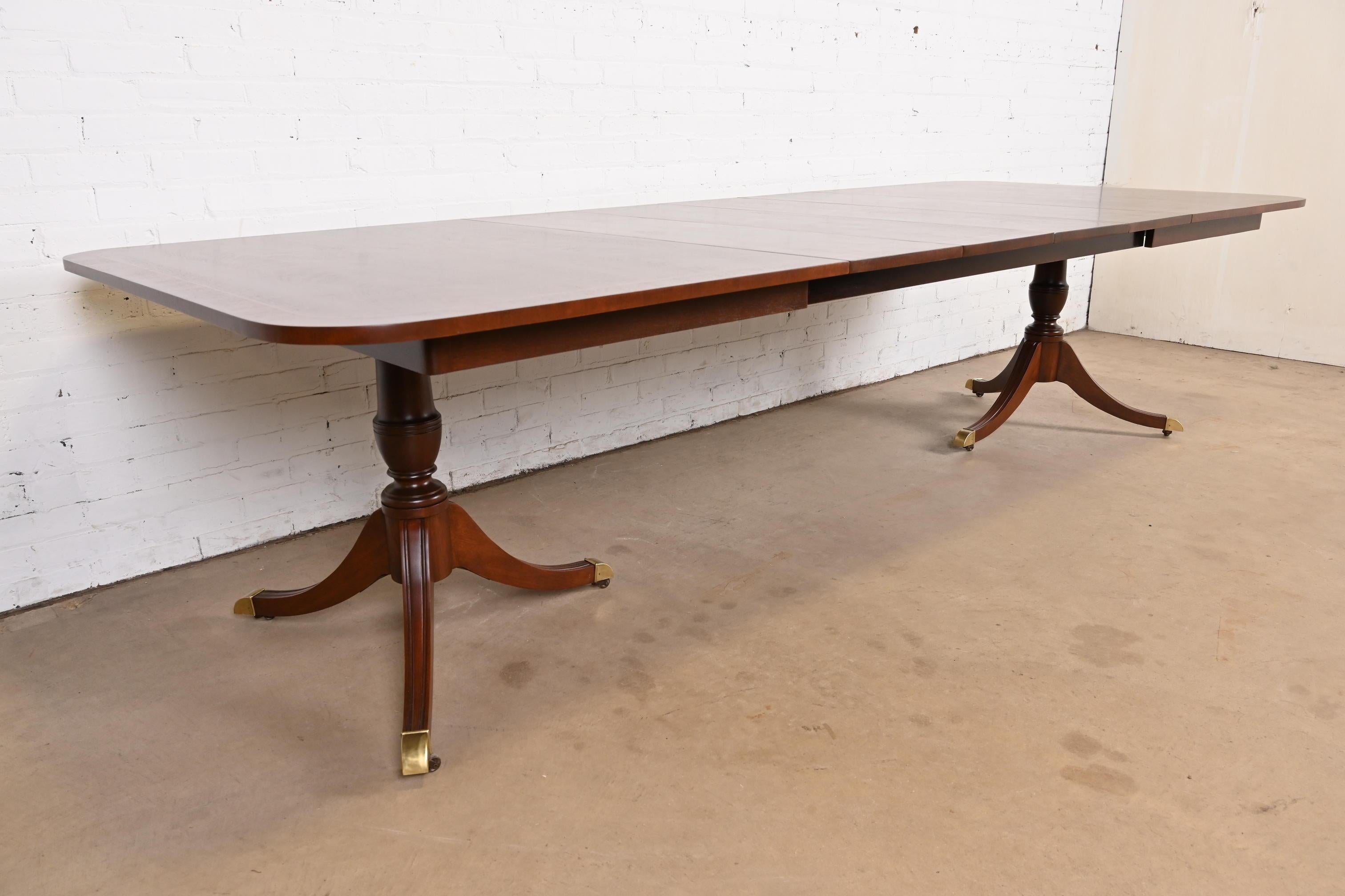 Kindel Furniture Georgian Banded Mahogany Double Pedestal Extension Dining Table In Good Condition For Sale In South Bend, IN