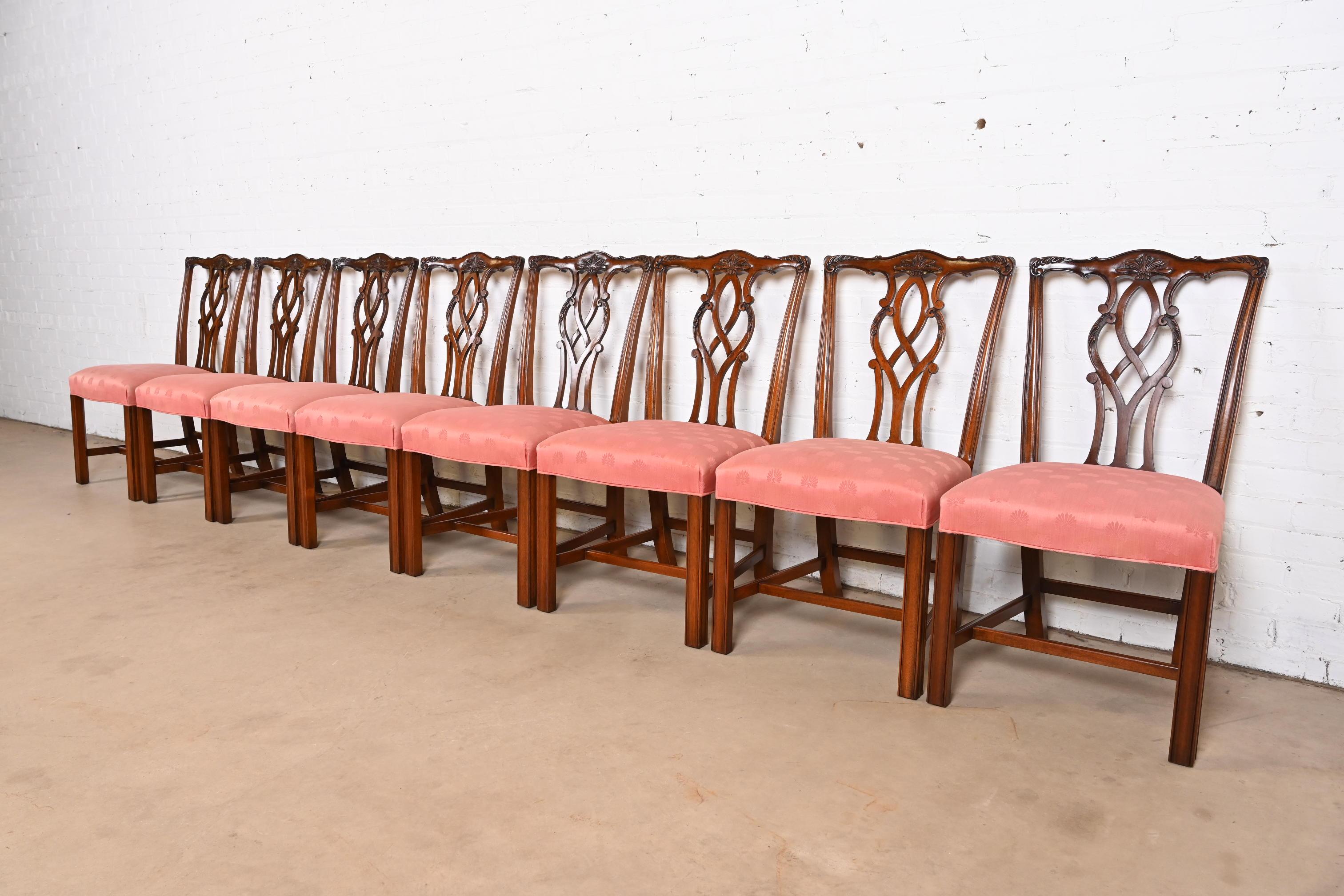 A gorgeous set of eight Georgian or Chippendale style dining chairs

By Kindel Furniture

USA, 1983

Solid carved mahogany frames, with upholstered seats.

Measures: 20.25