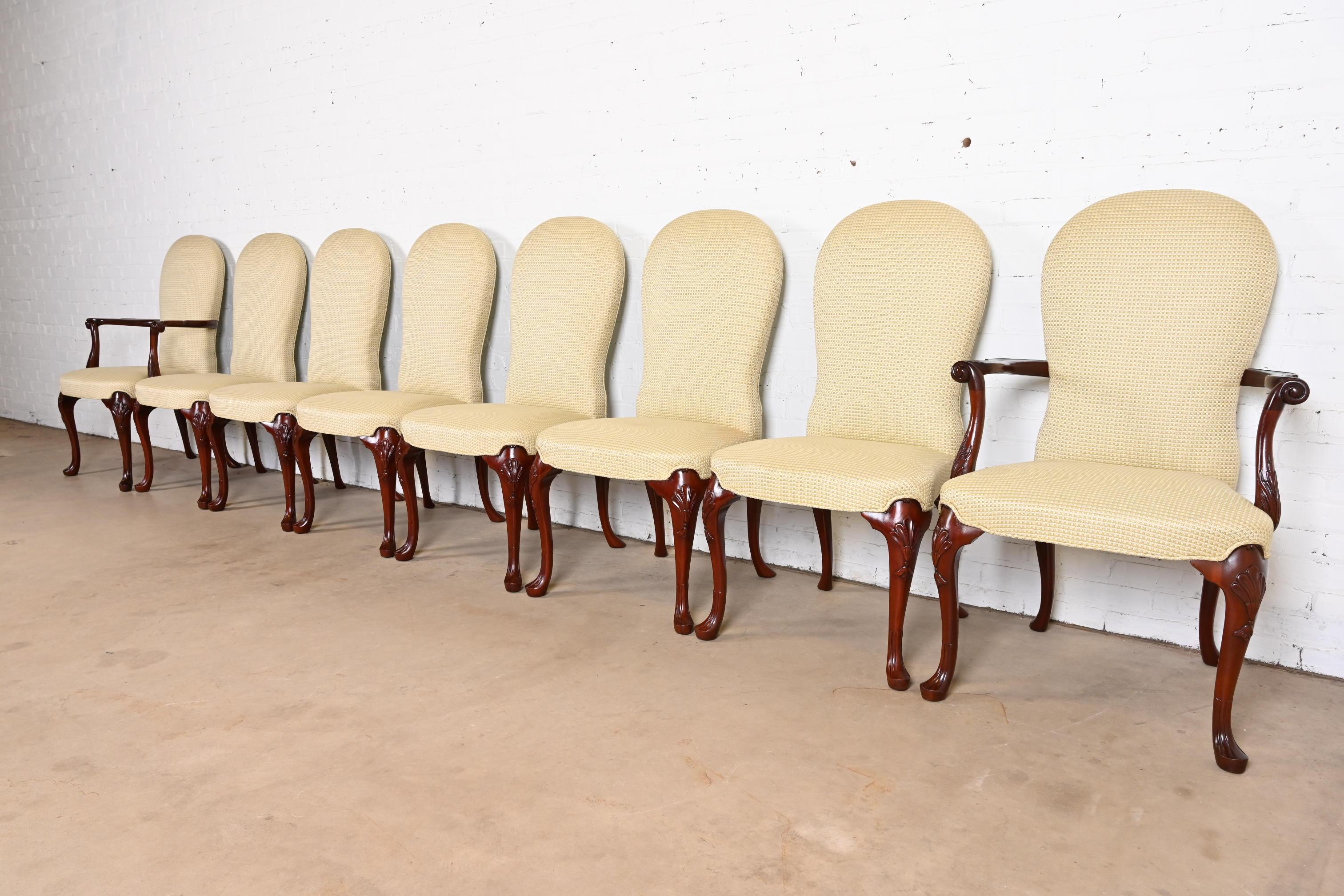 A gorgeous set of eight Georgian or Queen Anne style dining chairs

By Kindel Furniture

USA, Circa 1980s

Solid carved mahogany frames, with upholstered seats and backs.

Measures:
Side chairs - 22.5