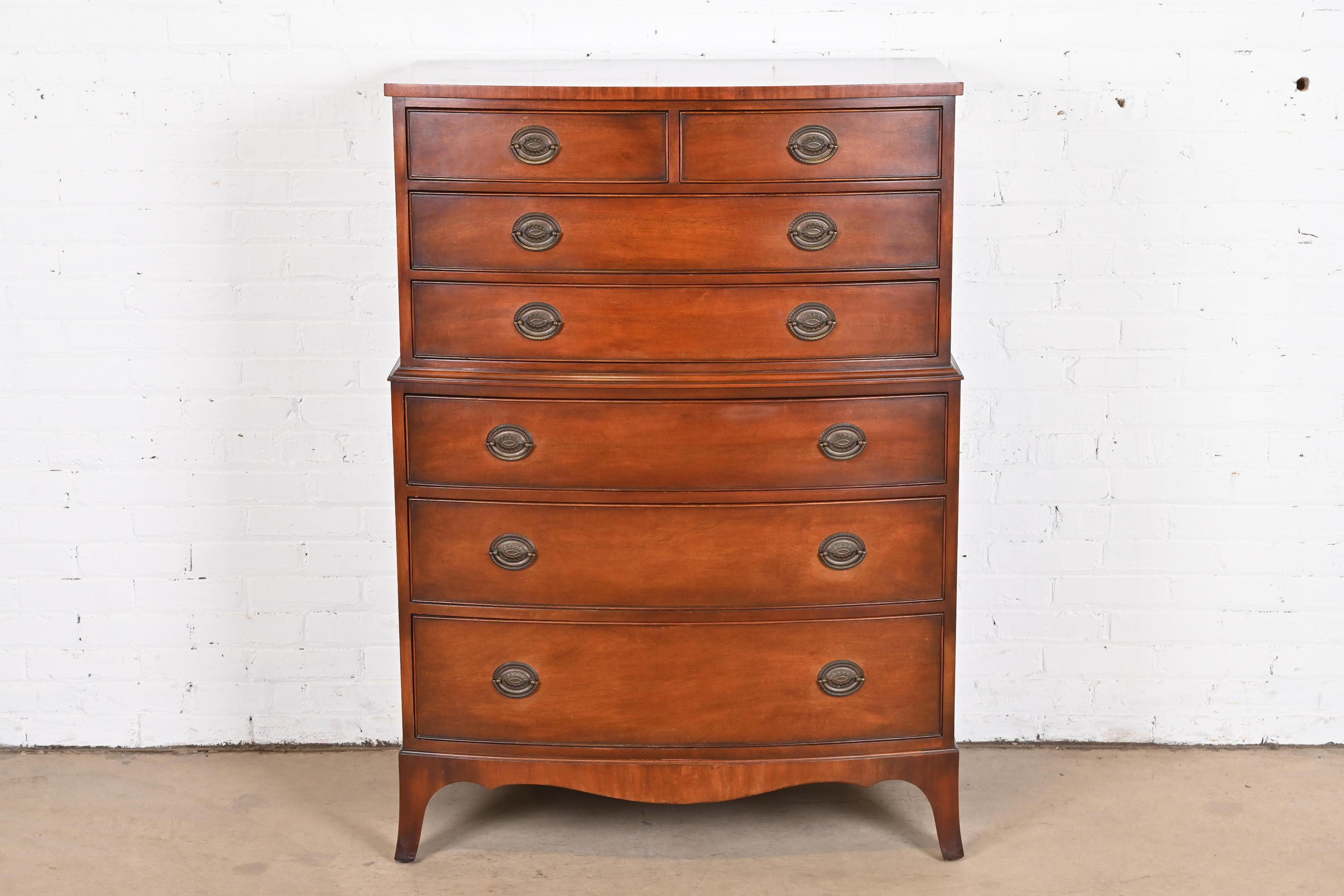 A gorgeous Georgian or Chippendale style seven-drawer highboy dresser or chest of drawers

By Kindel Furniture

USA, circa 1960s

Mahogany, with original brass hardware.

Measures: 37