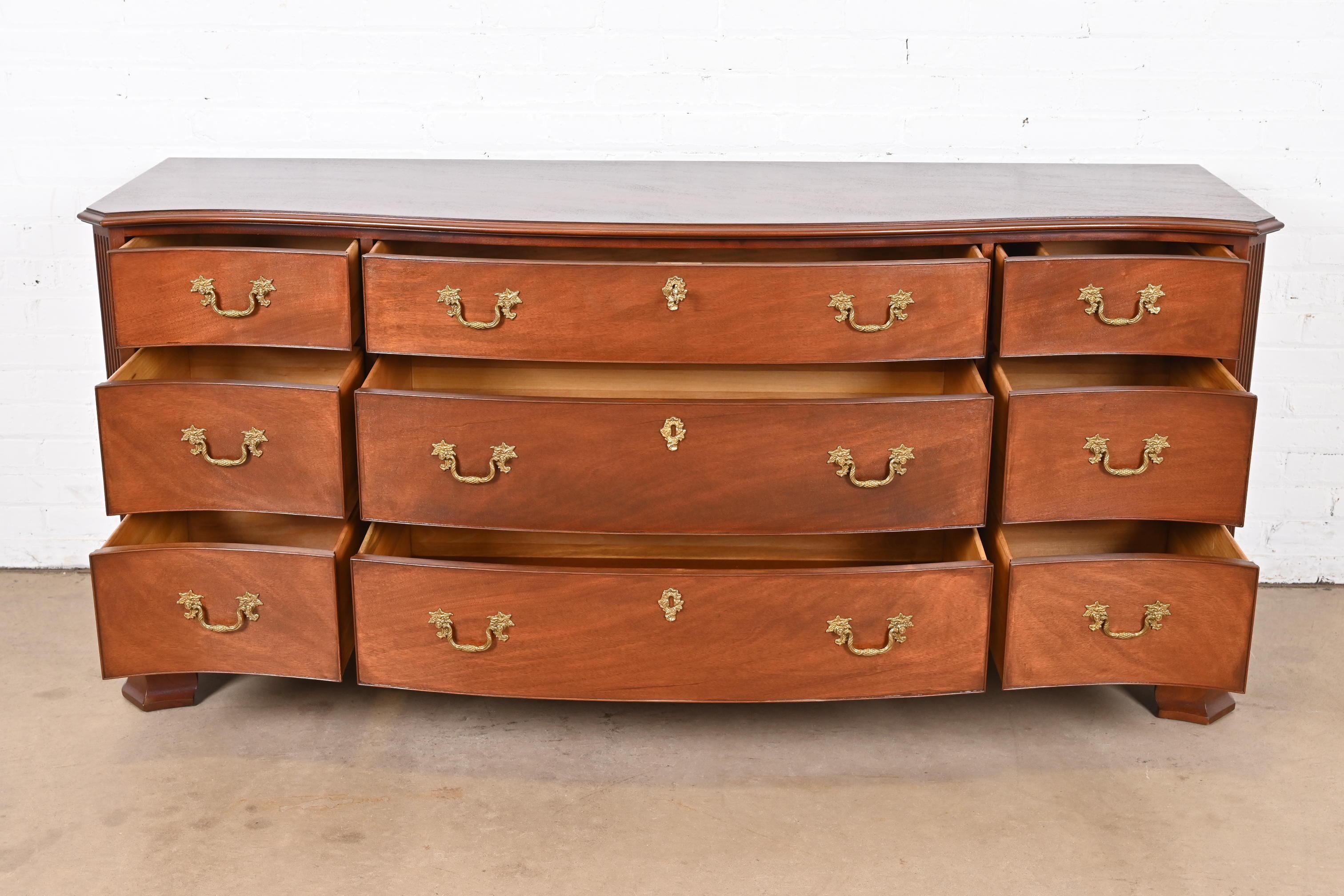 Brass Kindel Furniture Georgian Mahogany Serpentine Front Nine-Drawer Dresser For Sale