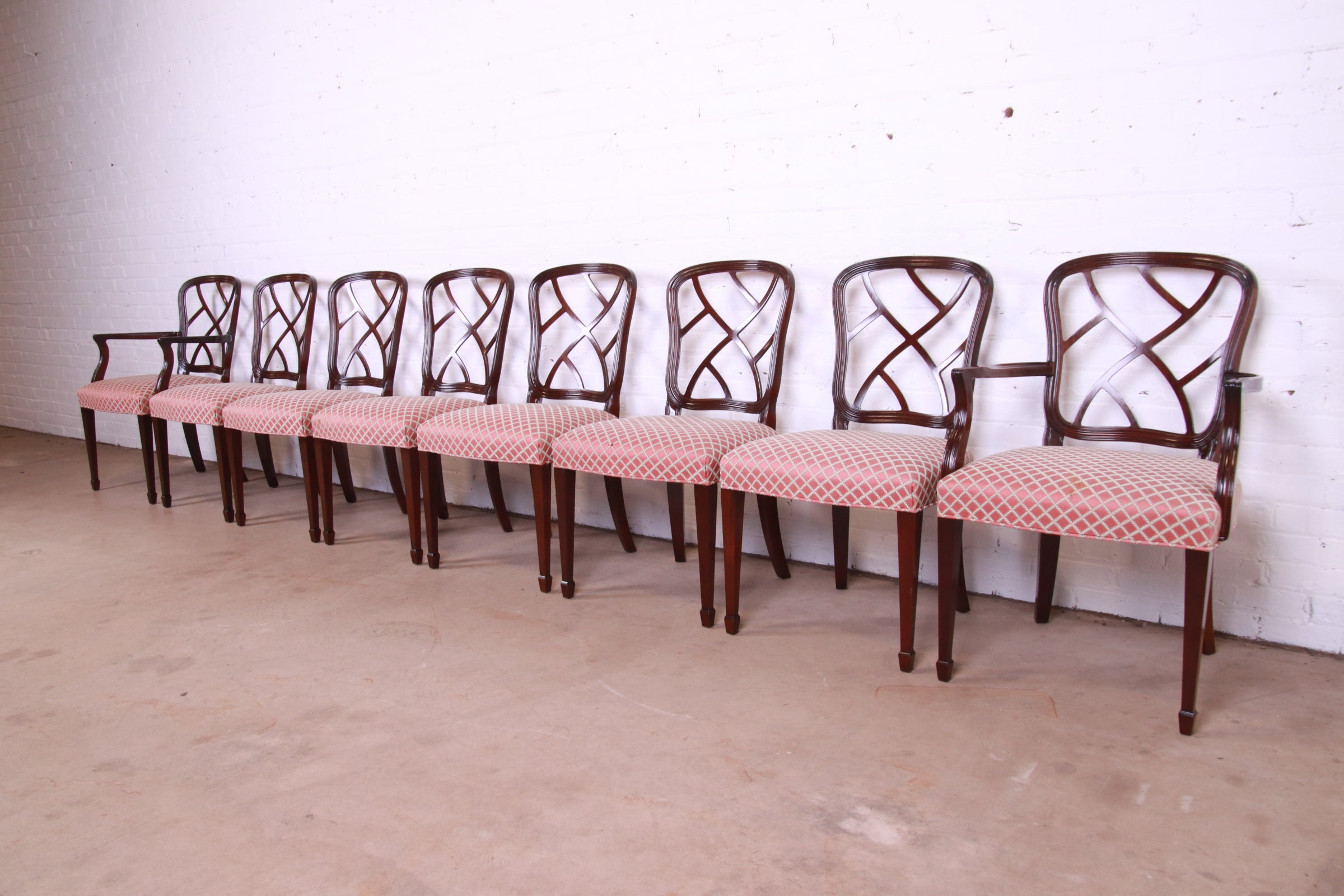 A gorgeous set of eight Federal or Hepplewhite style dining chairs

By Kindel Furniture

USA, 1980s

Solid carved mahogany frames, with pink, green, and cream upholstered seats.

Measures:
Side chairs - 20.5