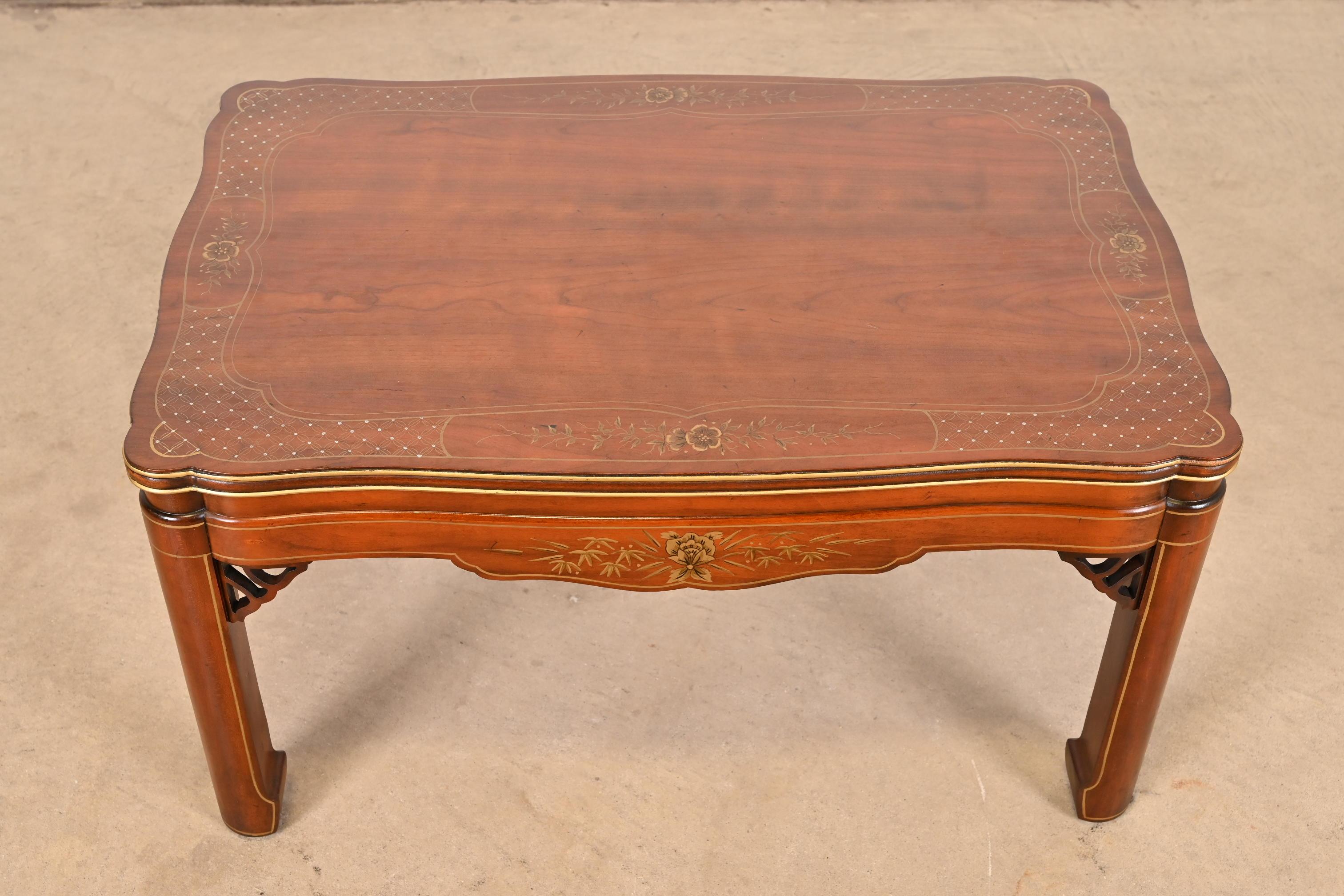 A beautiful Hollywood Regency Chinoiserie or Chinese Chippendale style coffee or cocktail table

By Kindel Furniture

USA, Circa 1980s

Beautiful carved cherry wood, with hand painted Asian details.

Measures: 30