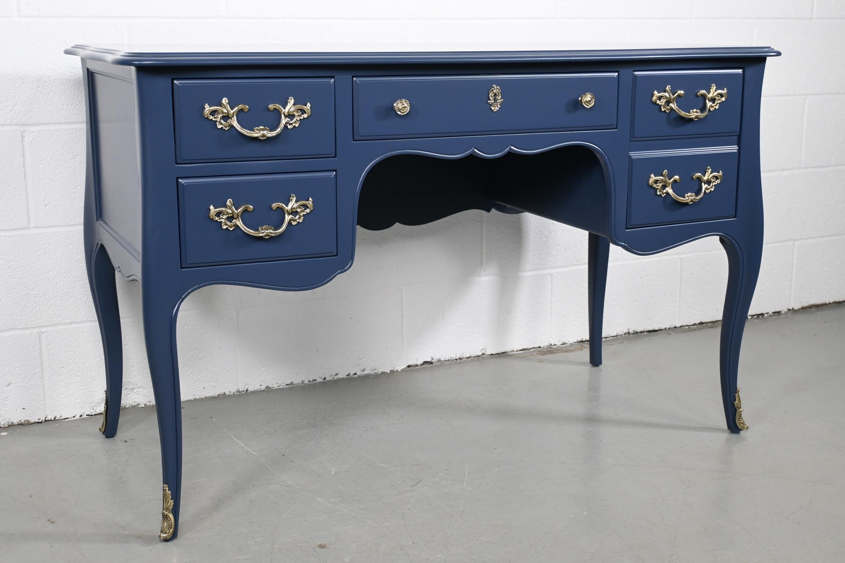Kindel Navy Lacquered French Desk with Brass Ormolu

Kindel Furniture, USA, 1970s

Measures: 48.25 Wide x 23 Deep x 30.13 High.

French style four drawer desk refinished with Sherwin Williams Naval lacquer with brass ormolu.

Professionally